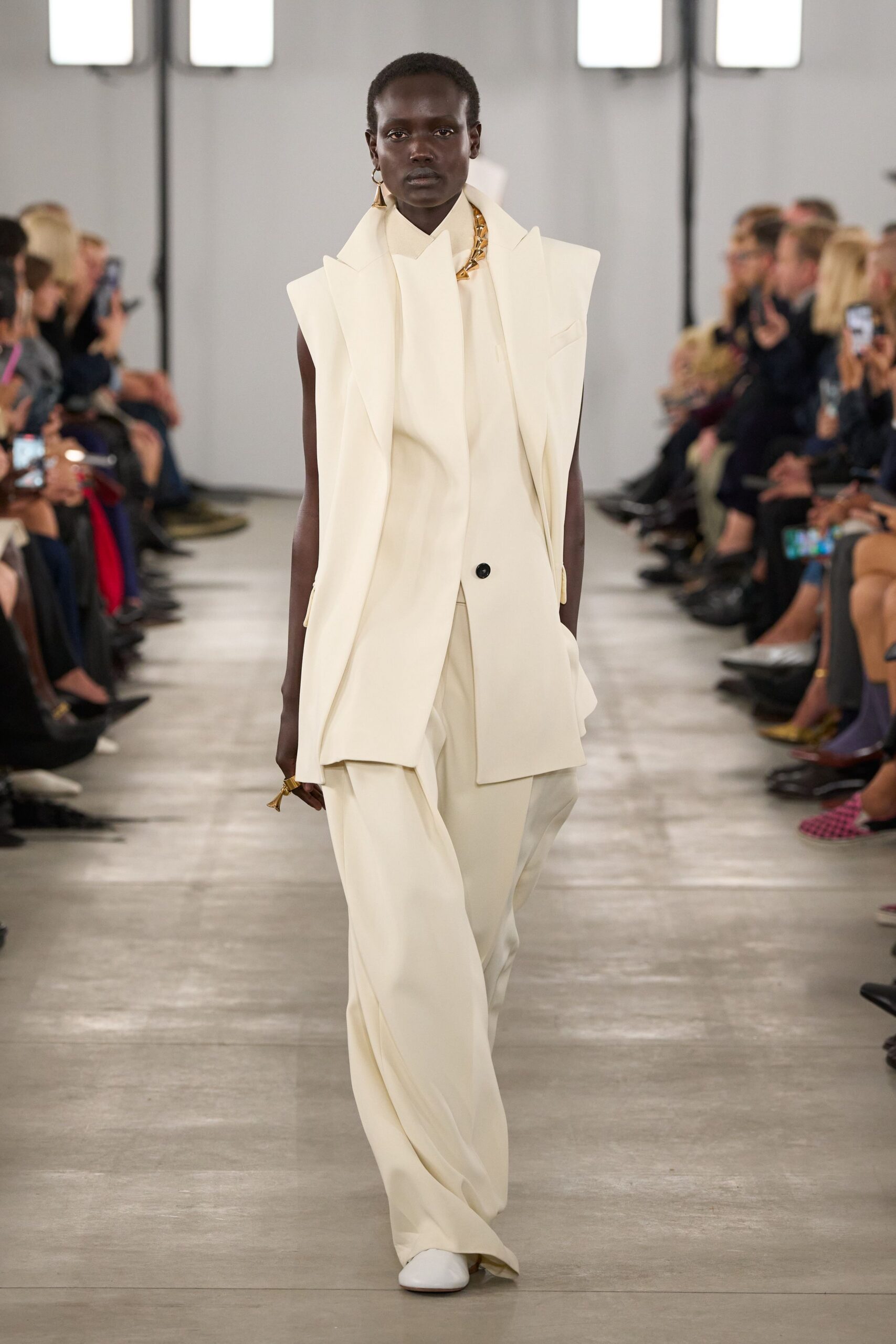 white relaxed suit with wide-leg pants