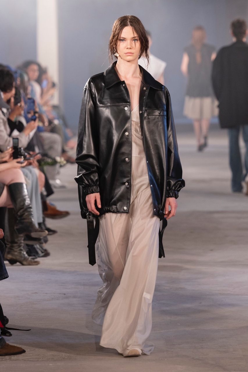 black leather relaxed jacket and white silk dress