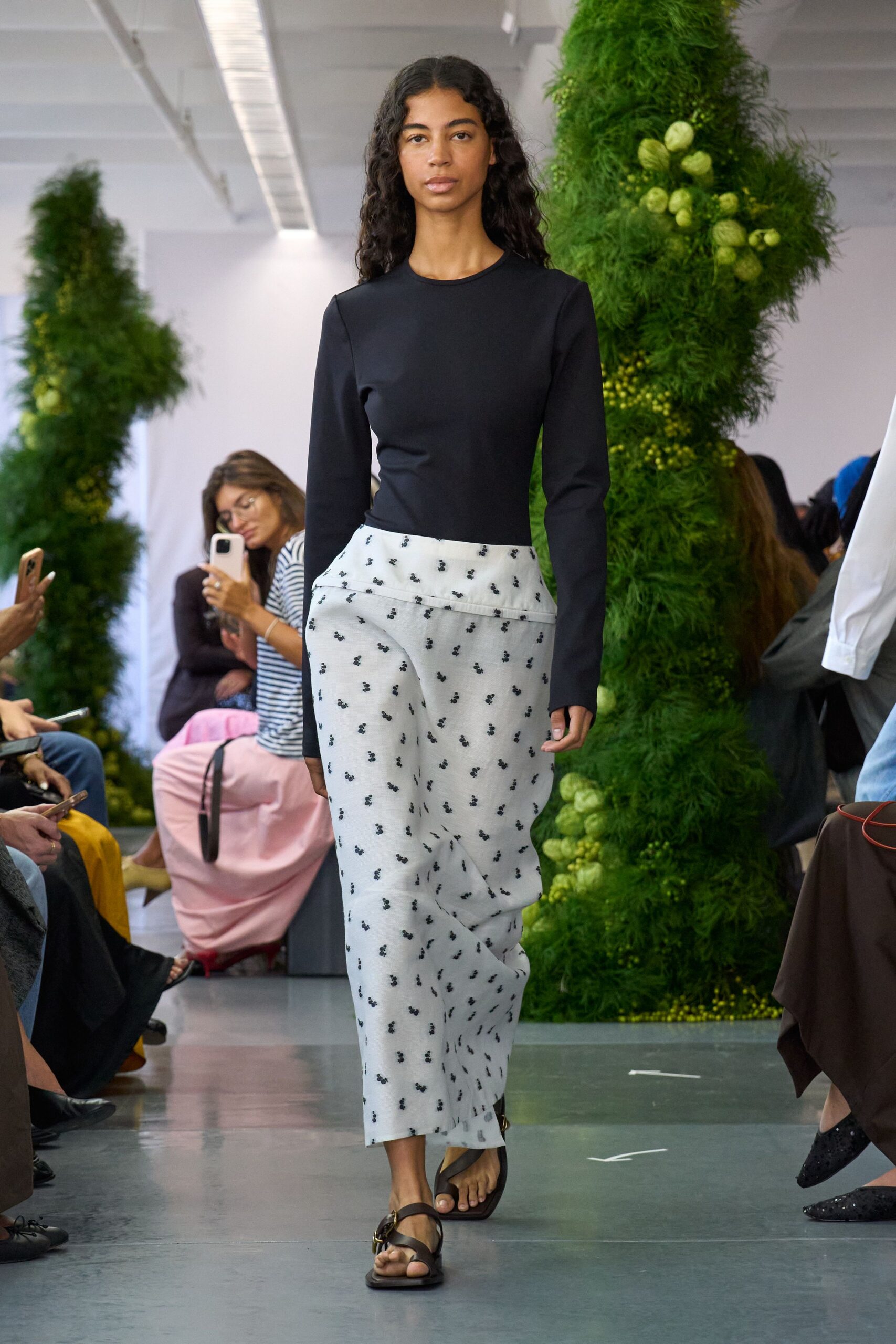 black fitted top with printed skirt