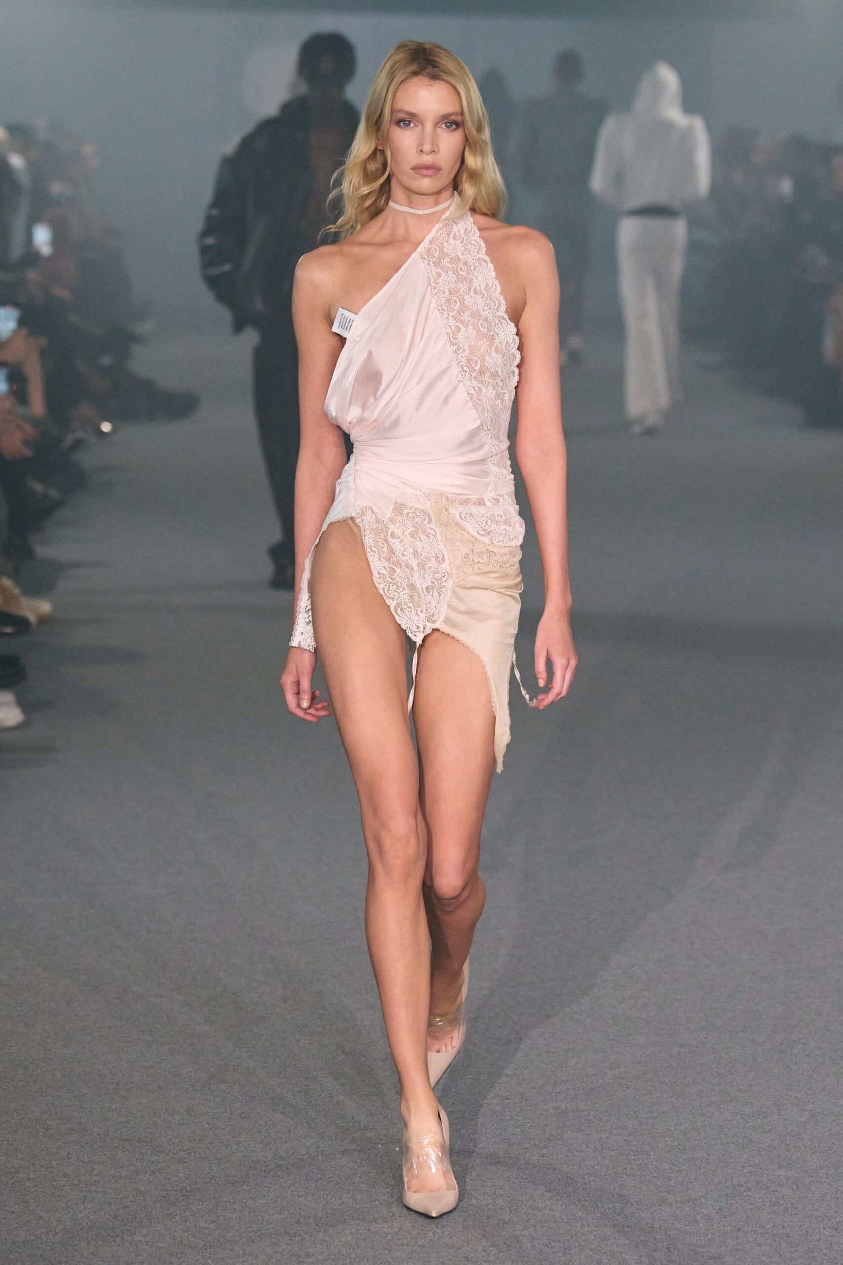 white asymmetric mini dress with clear shoes