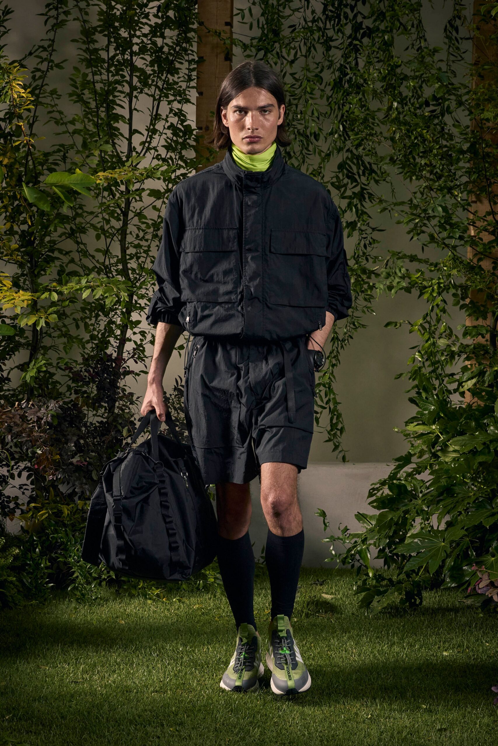 black relaxed jacket with green turtleneck