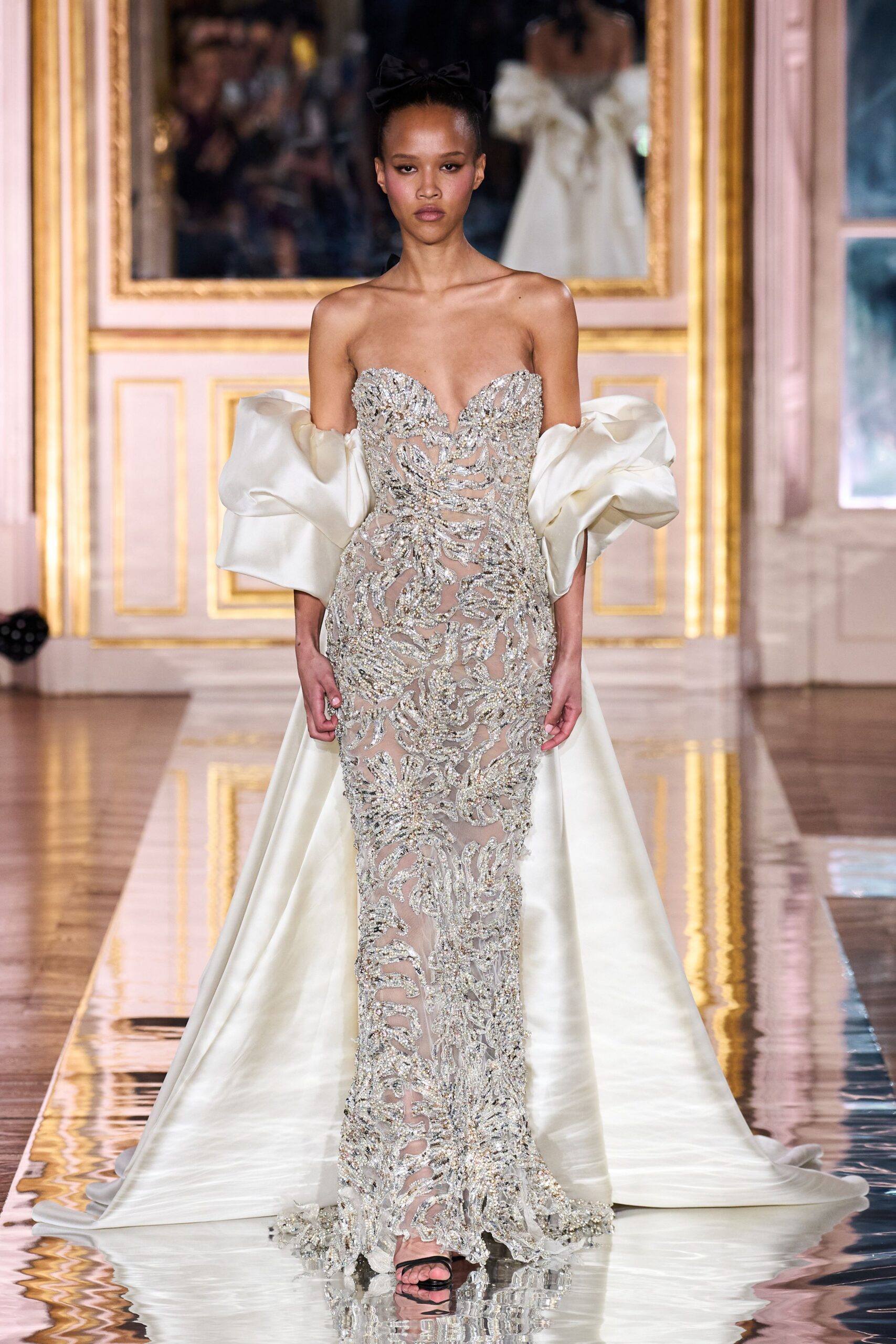 beige embroidered strapless gown