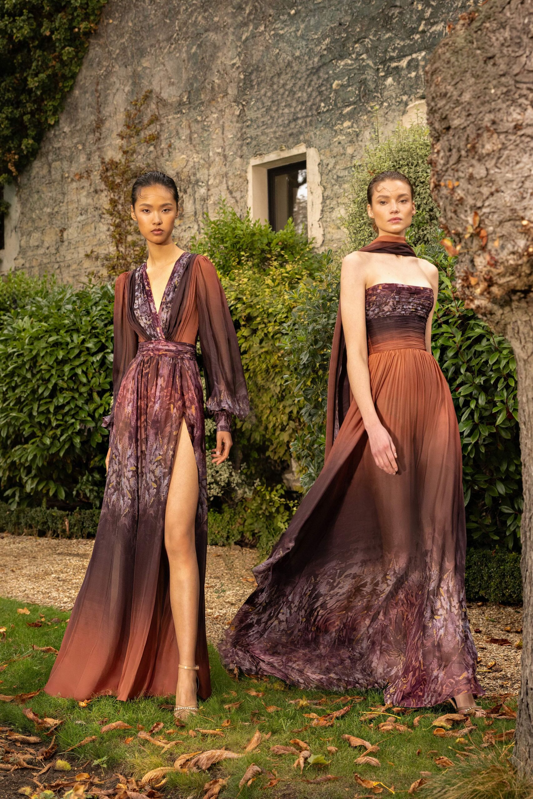 purple silk strapless fitted draped layered flowing gown