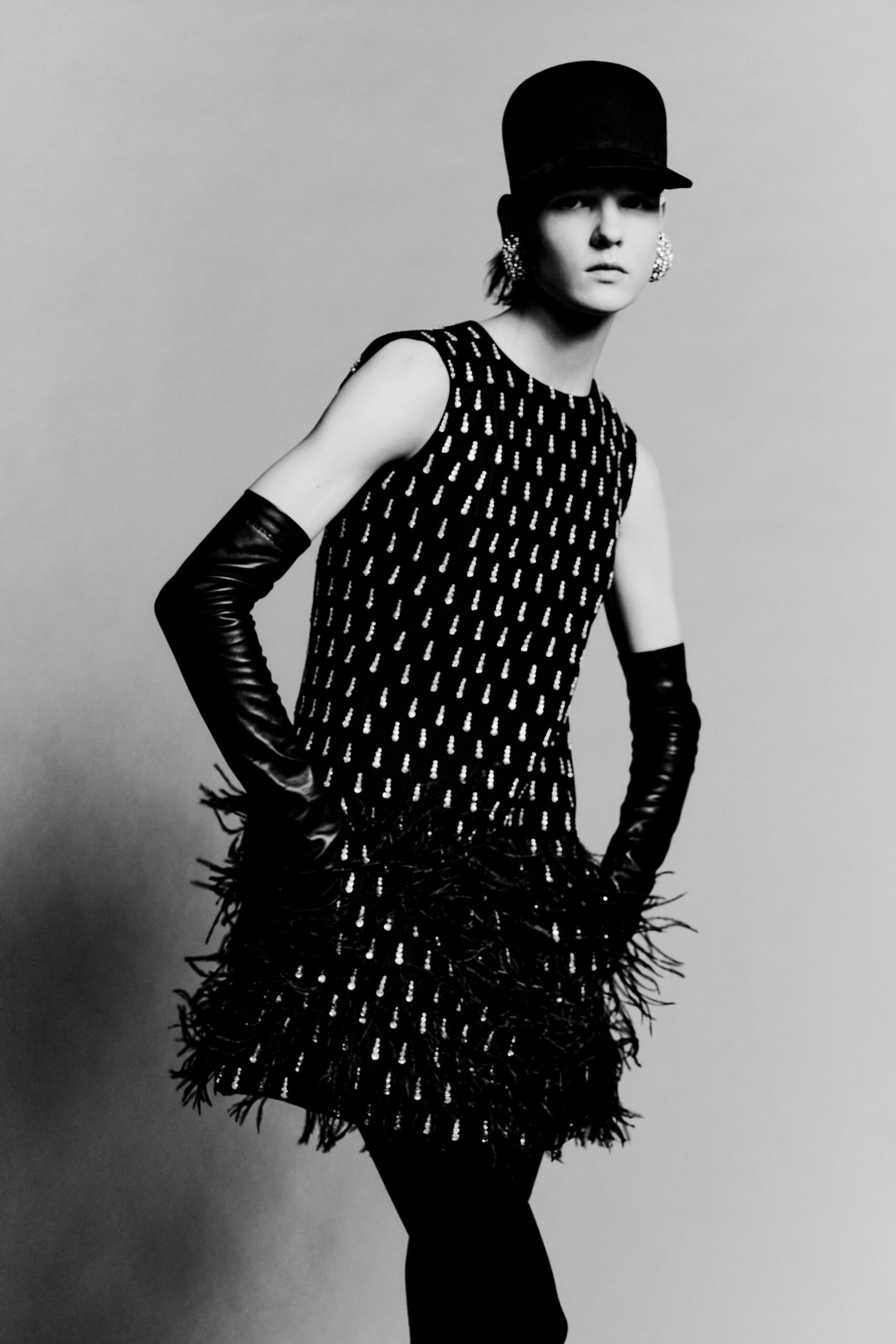 black silk sleeveless high-neck fitted fringed pleated dress