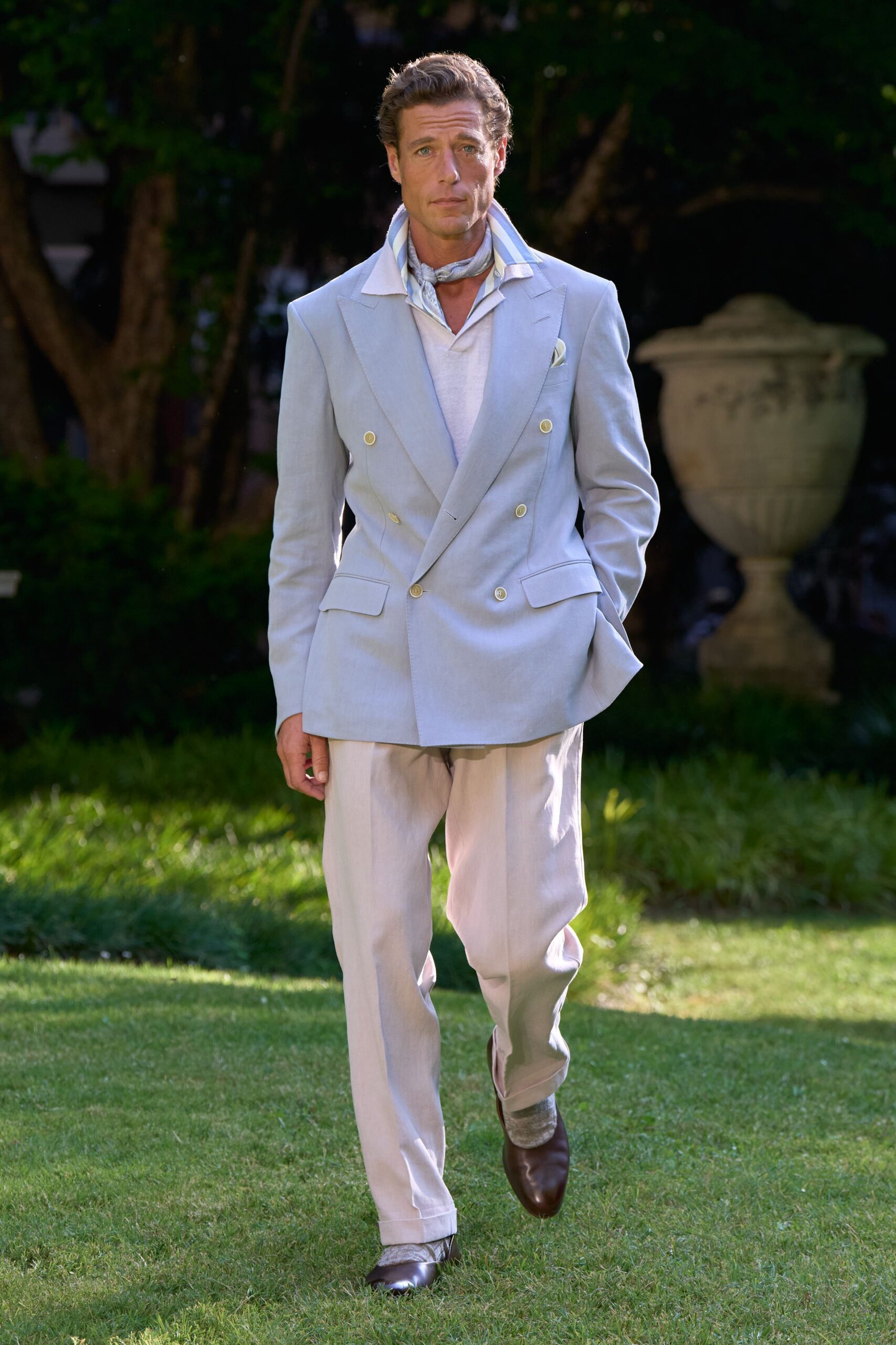 light blue tailored suit with scarf