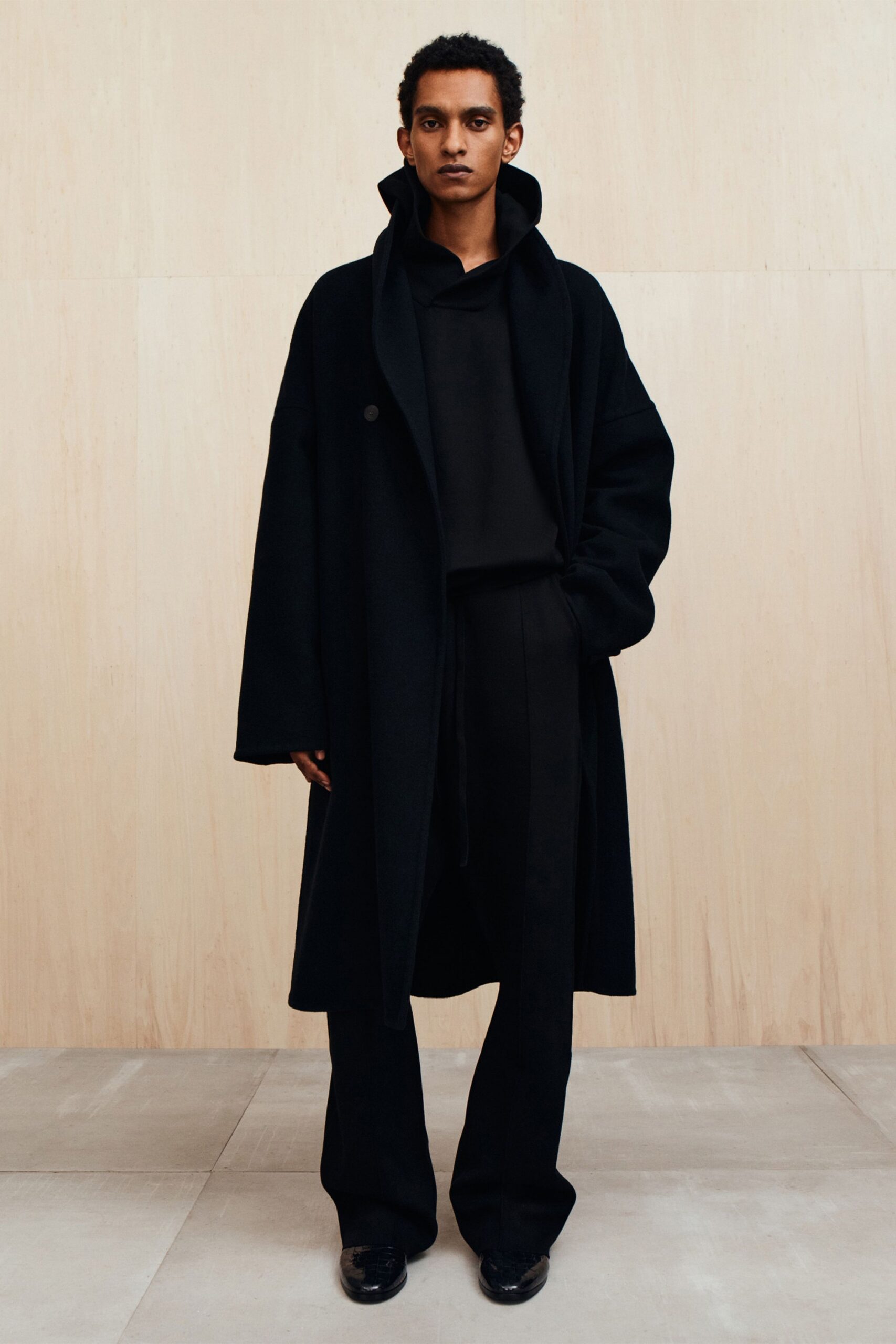 black oversized coat and hoodie
