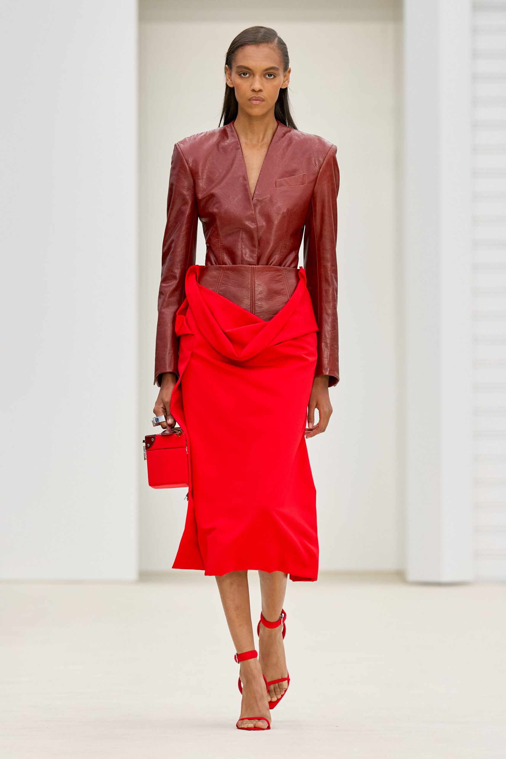 red leather long-sleeve v-neck fitted ruched midi dress