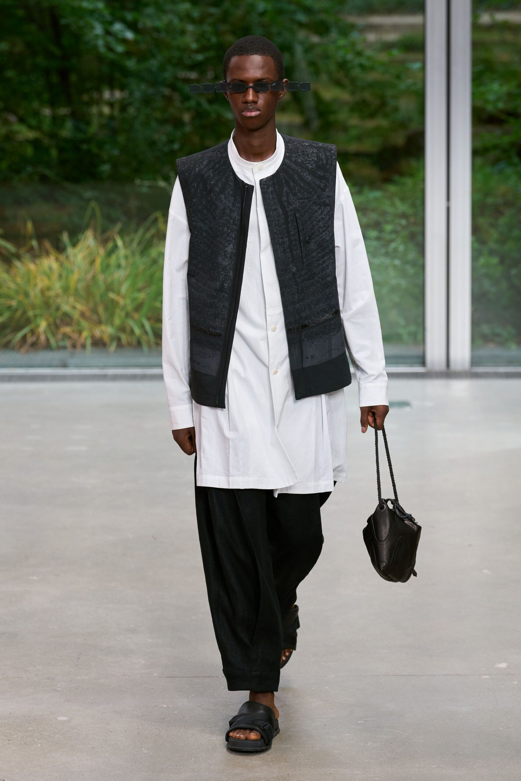 black vest over white shirt