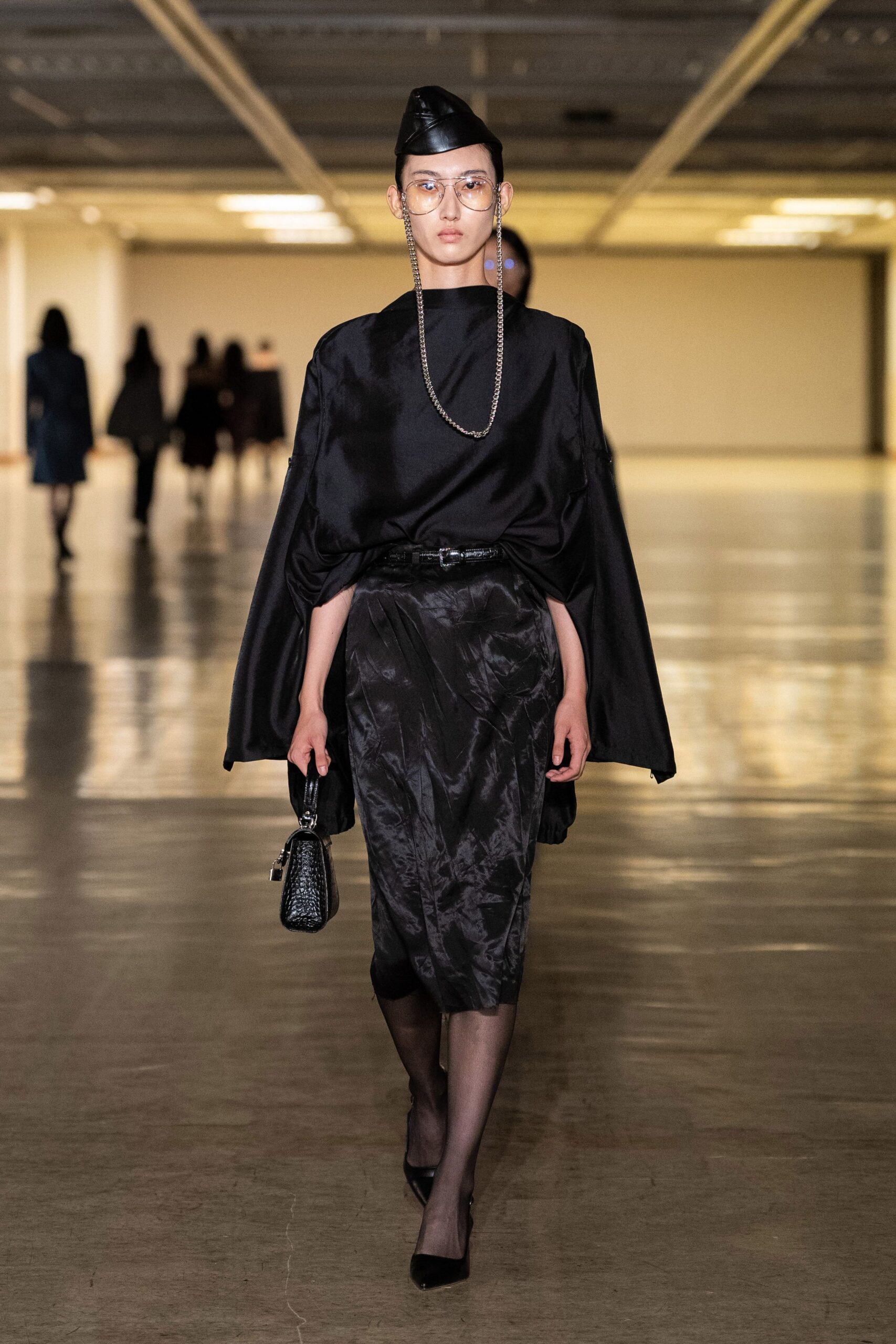 black silk long-sleeve high-neck relaxed draped top