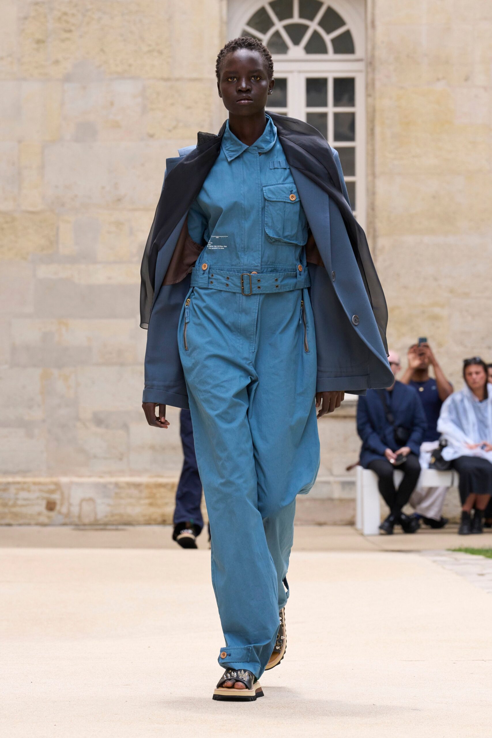 blue cotton long-sleeve collared fitted zippered pockets jumpsuit