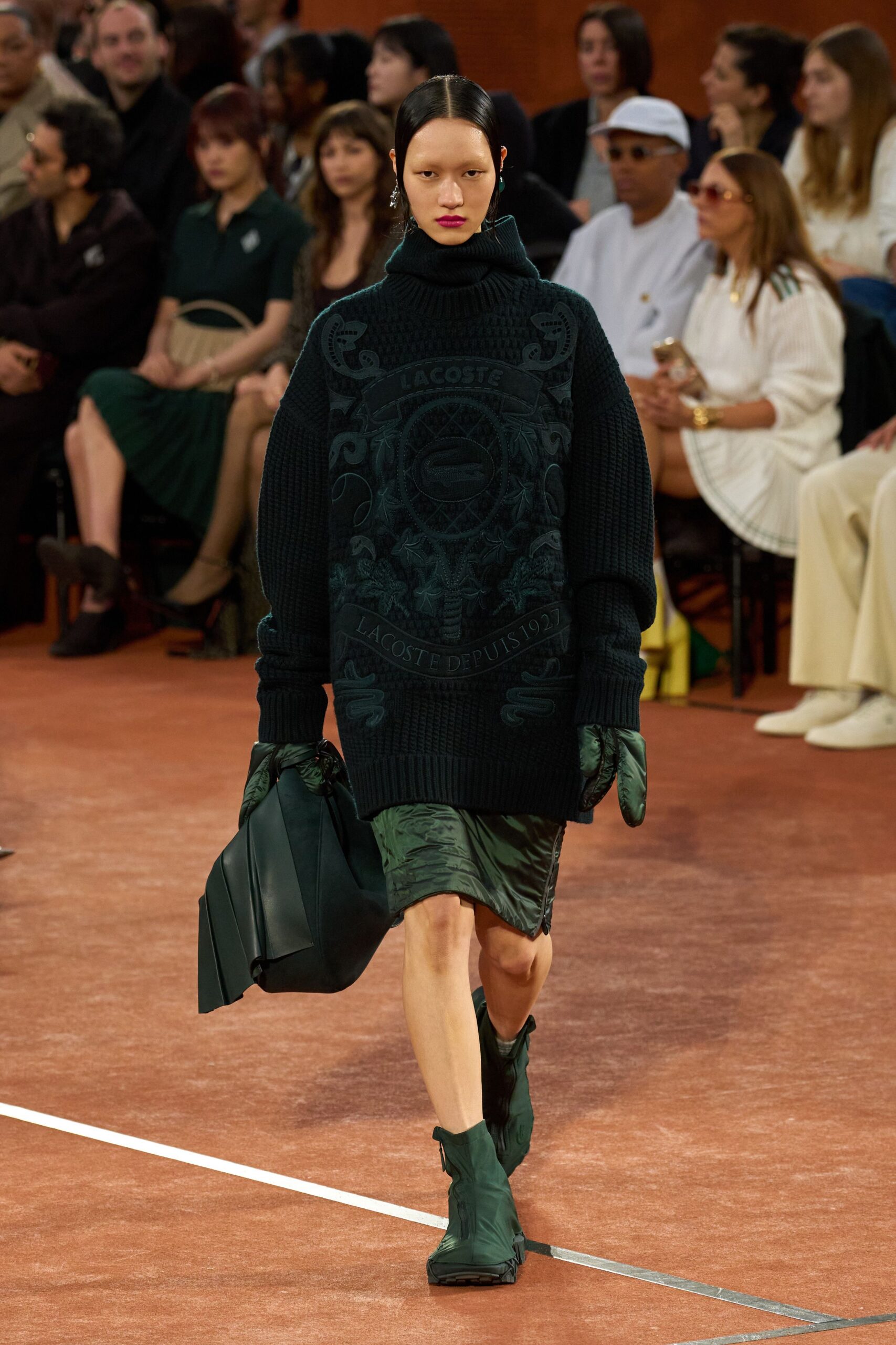 oversized black sweater with green skirt