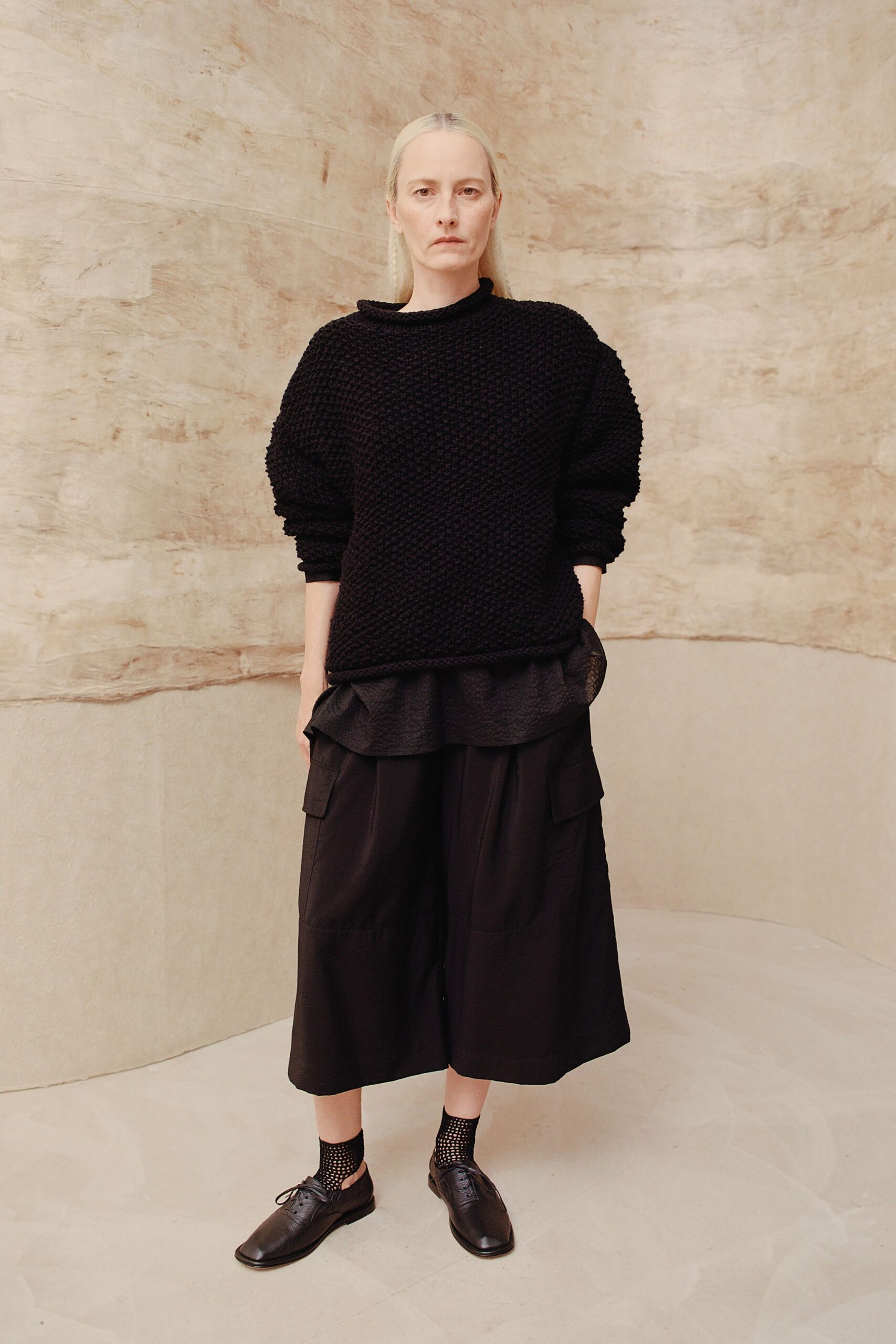 black wool long-sleeve high-neck relaxed textured sweater