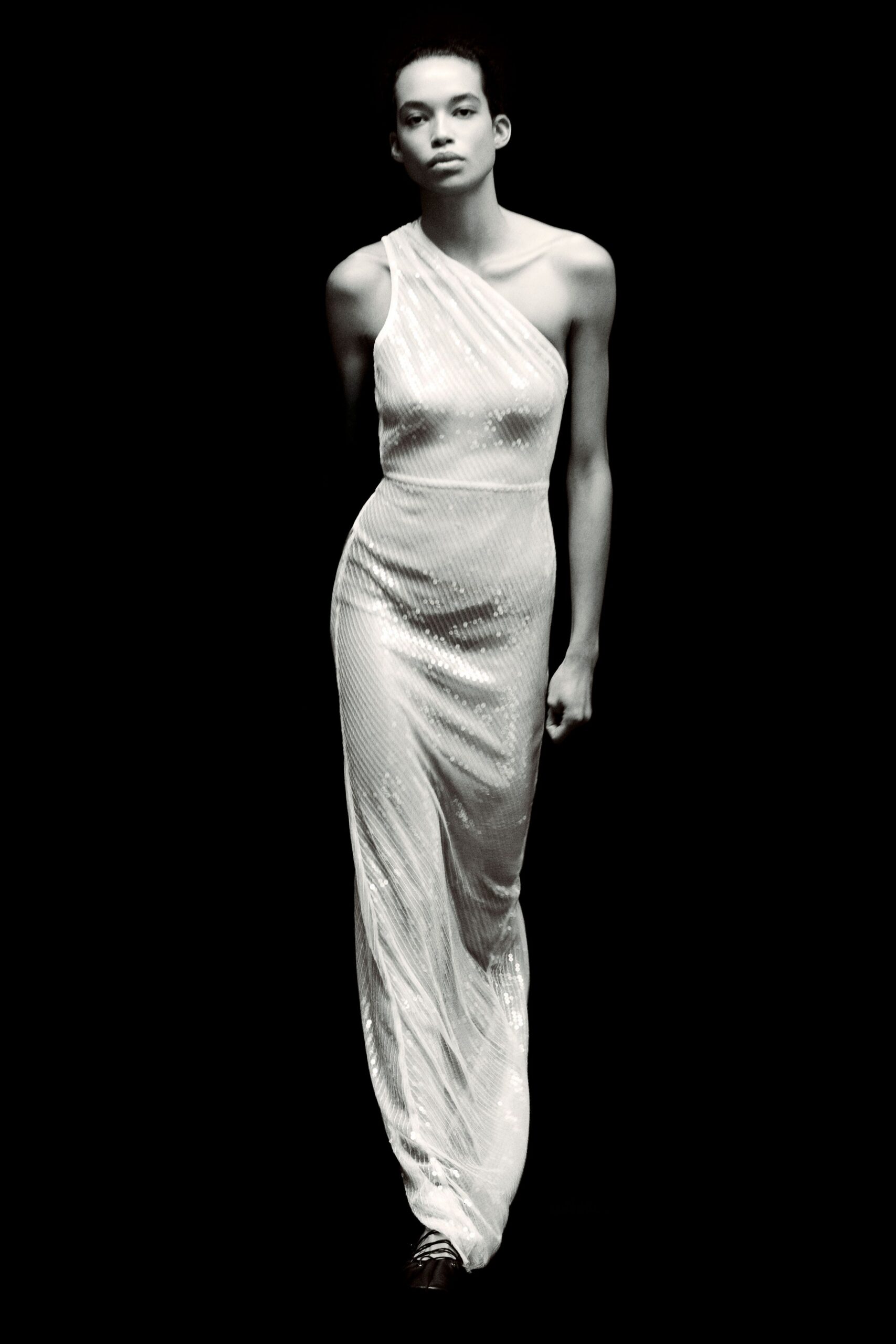 white fitted sleeveless gown