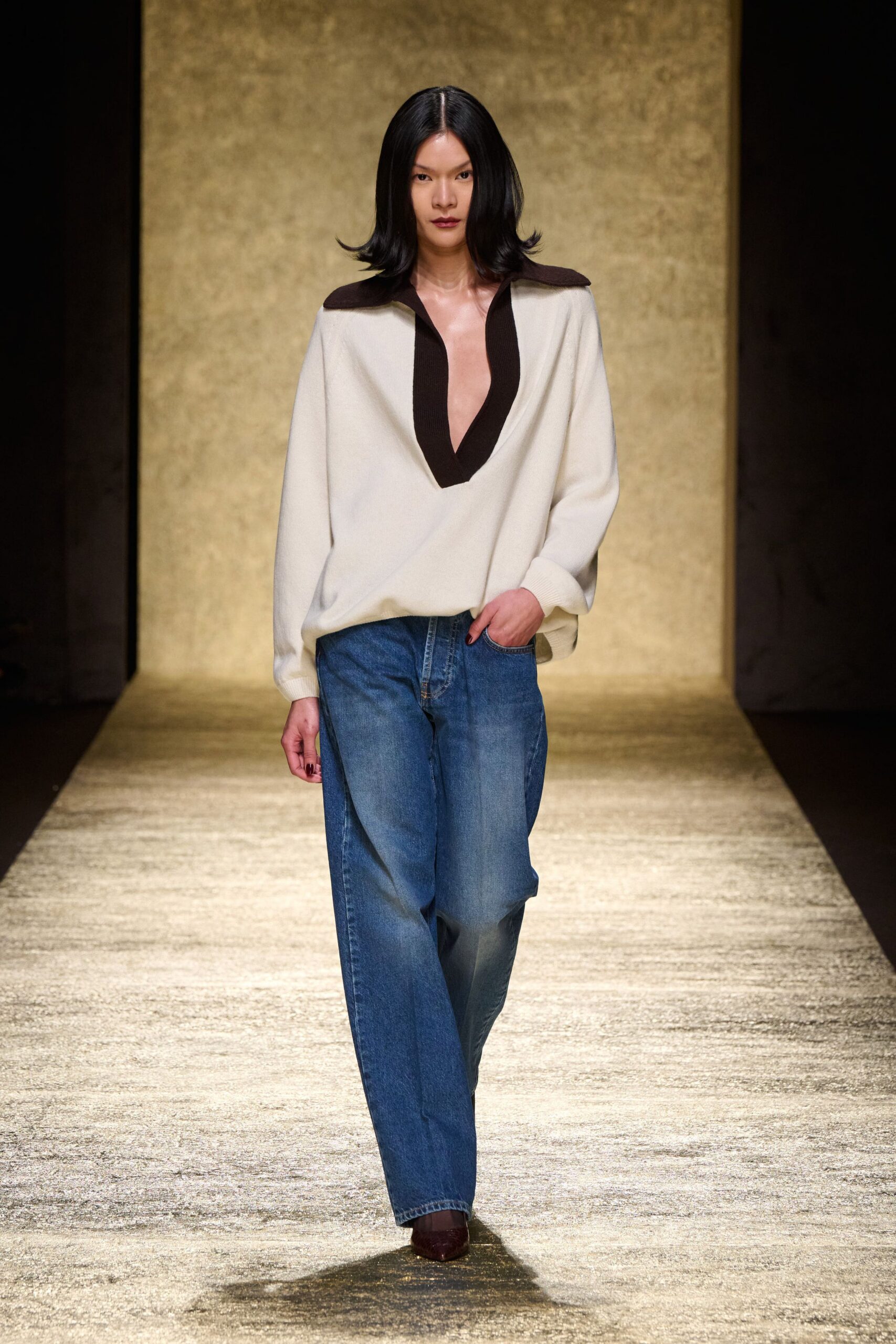 relaxed white sweater with blue jeans
