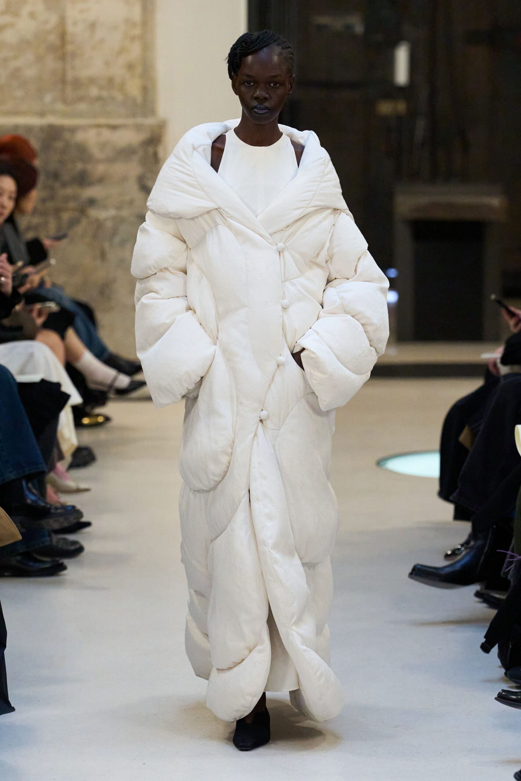 white padded coat with black shoes