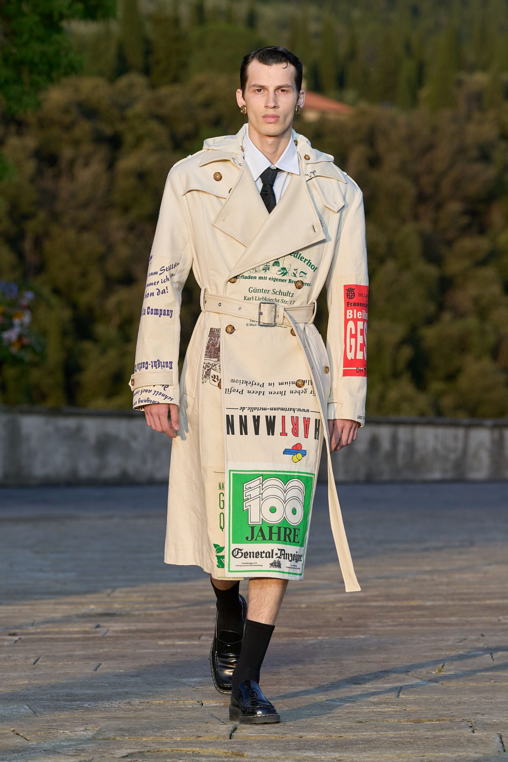 white cotton long-sleeve collared relaxed buttoned printed trench