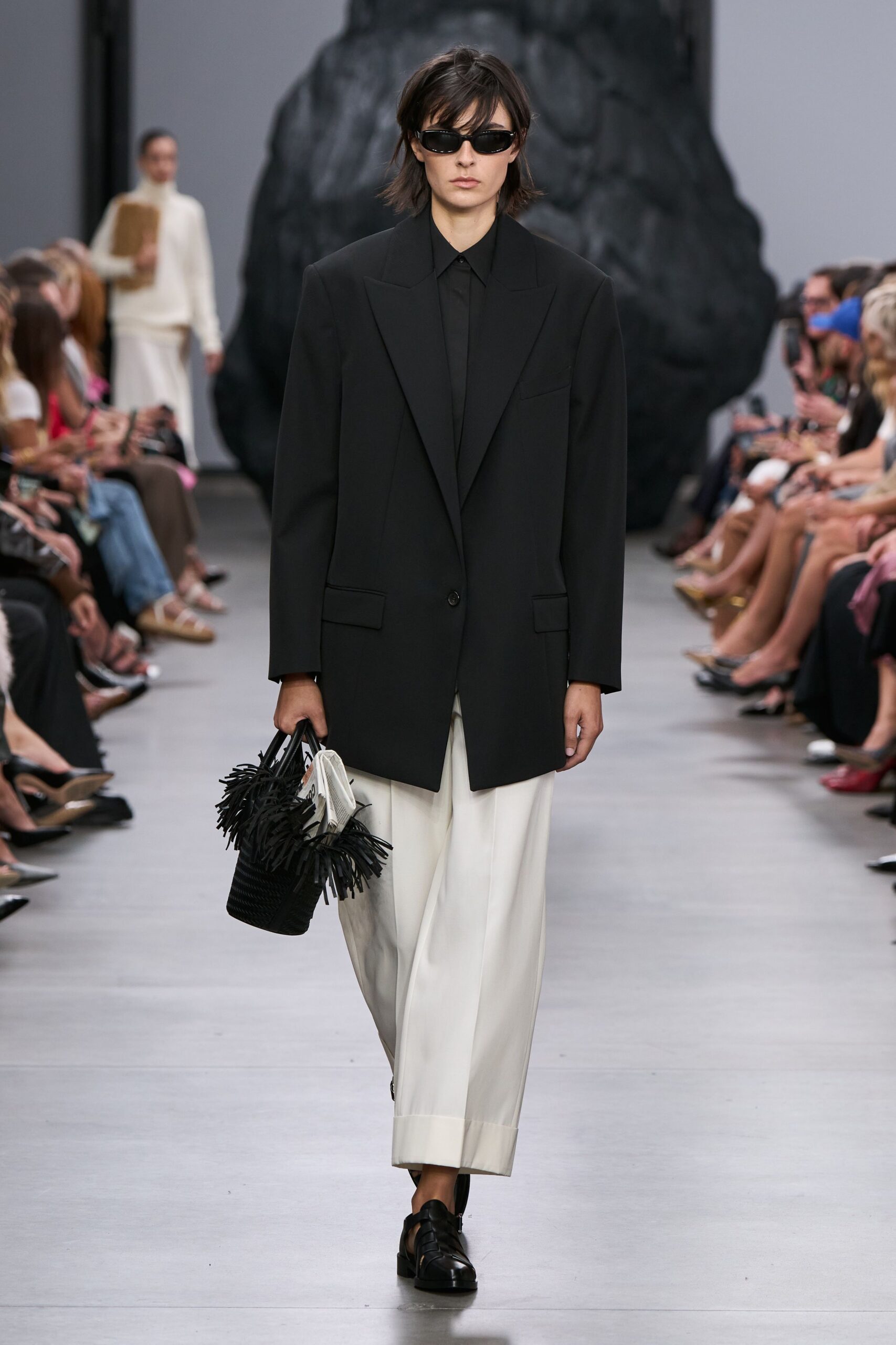 black oversized blazer with white pants