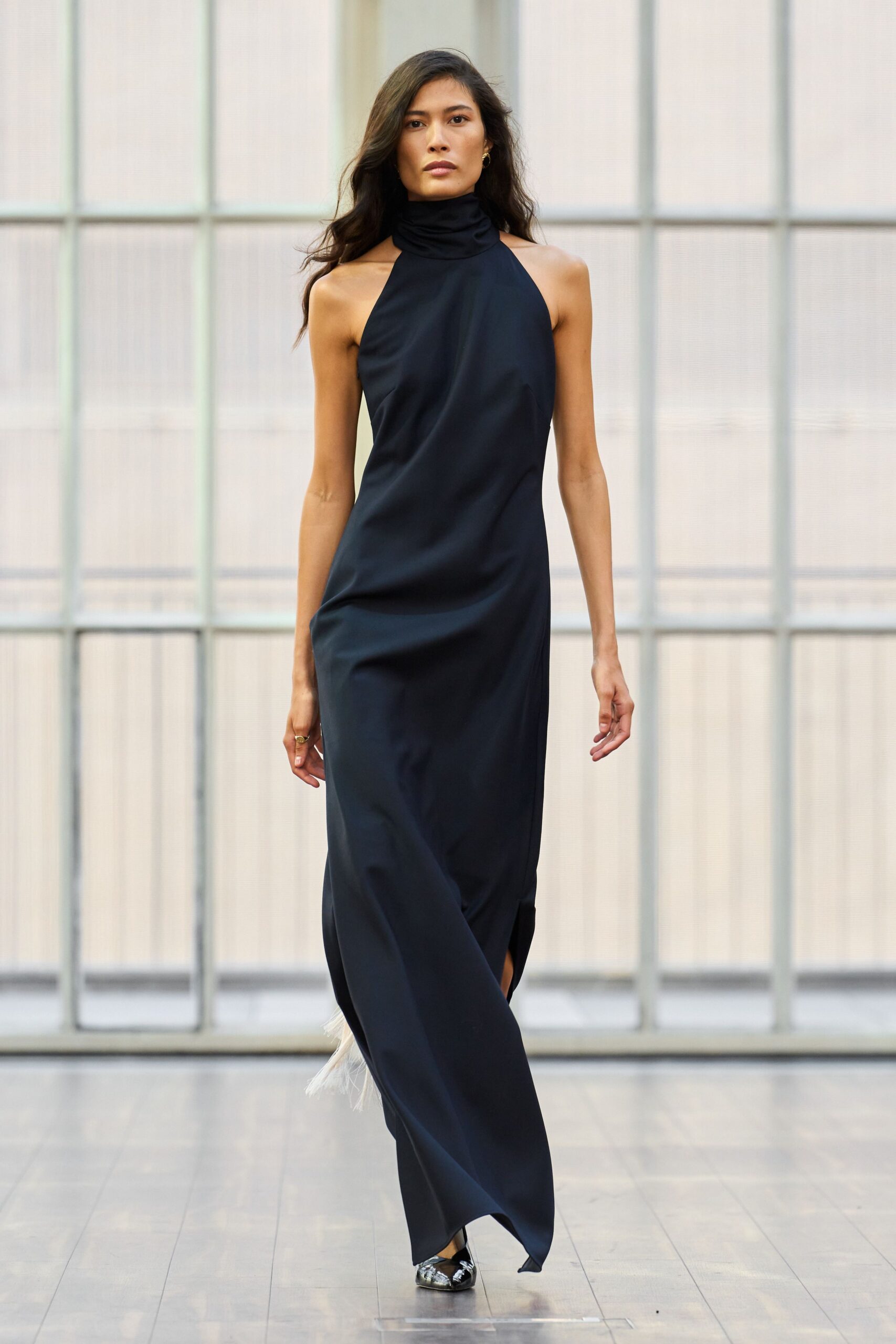 black silk sleeveless high-neck fitted flowing maxi gown