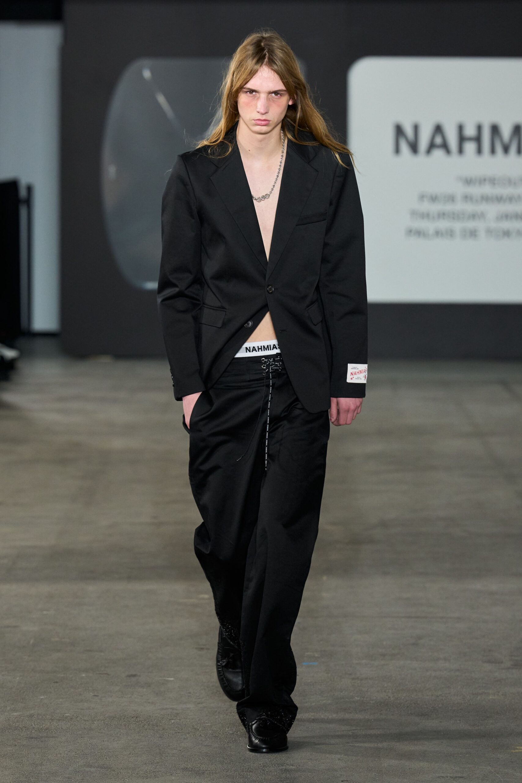 black fitted blazer with relaxed pants