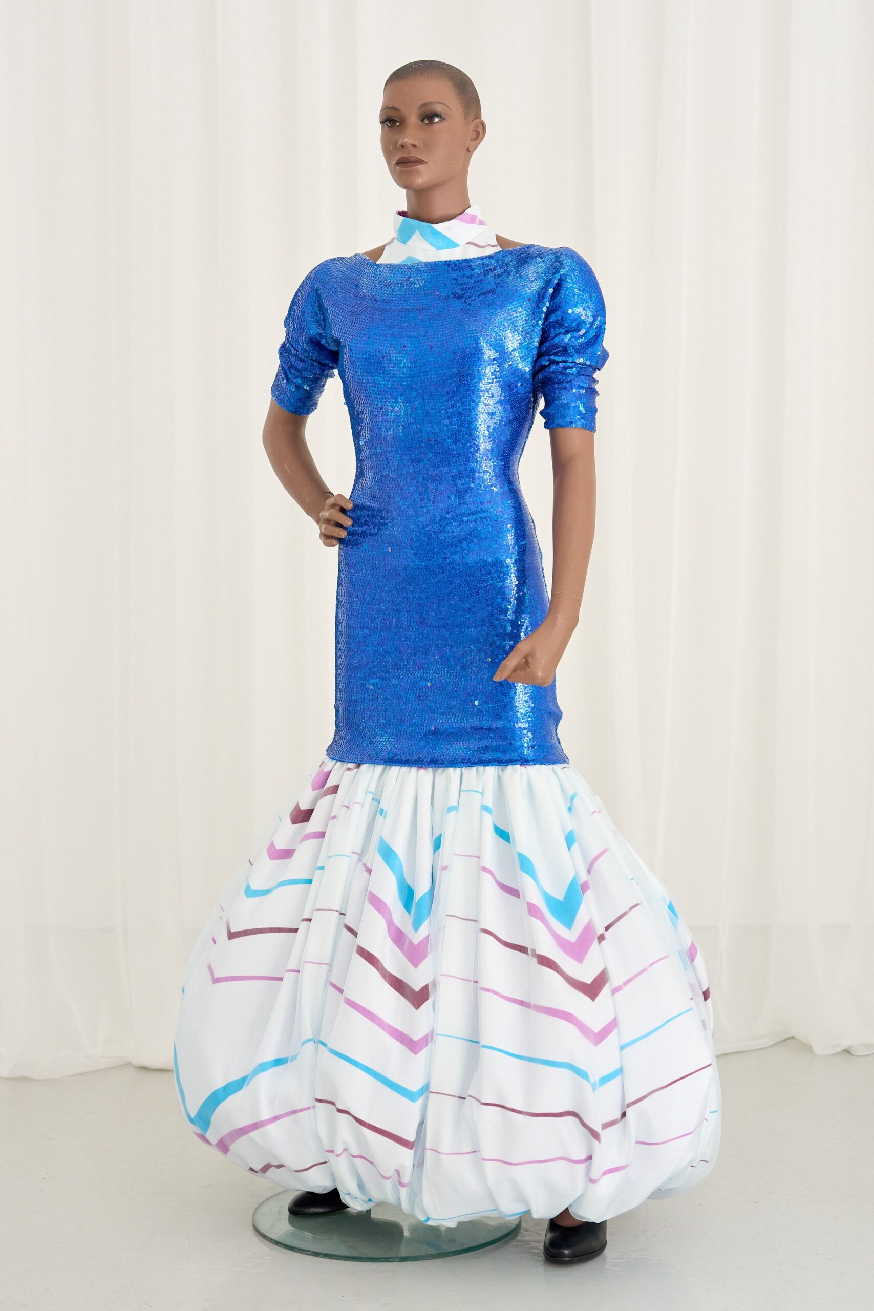 blue sequin gown with pleats