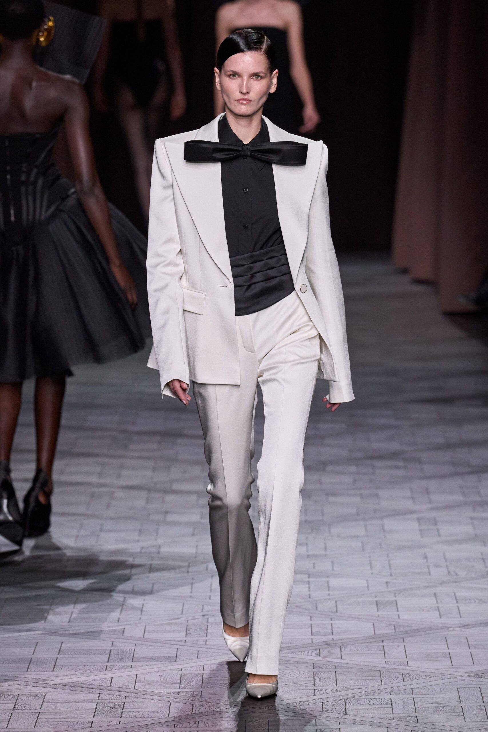 white tailored suit with black shirt
