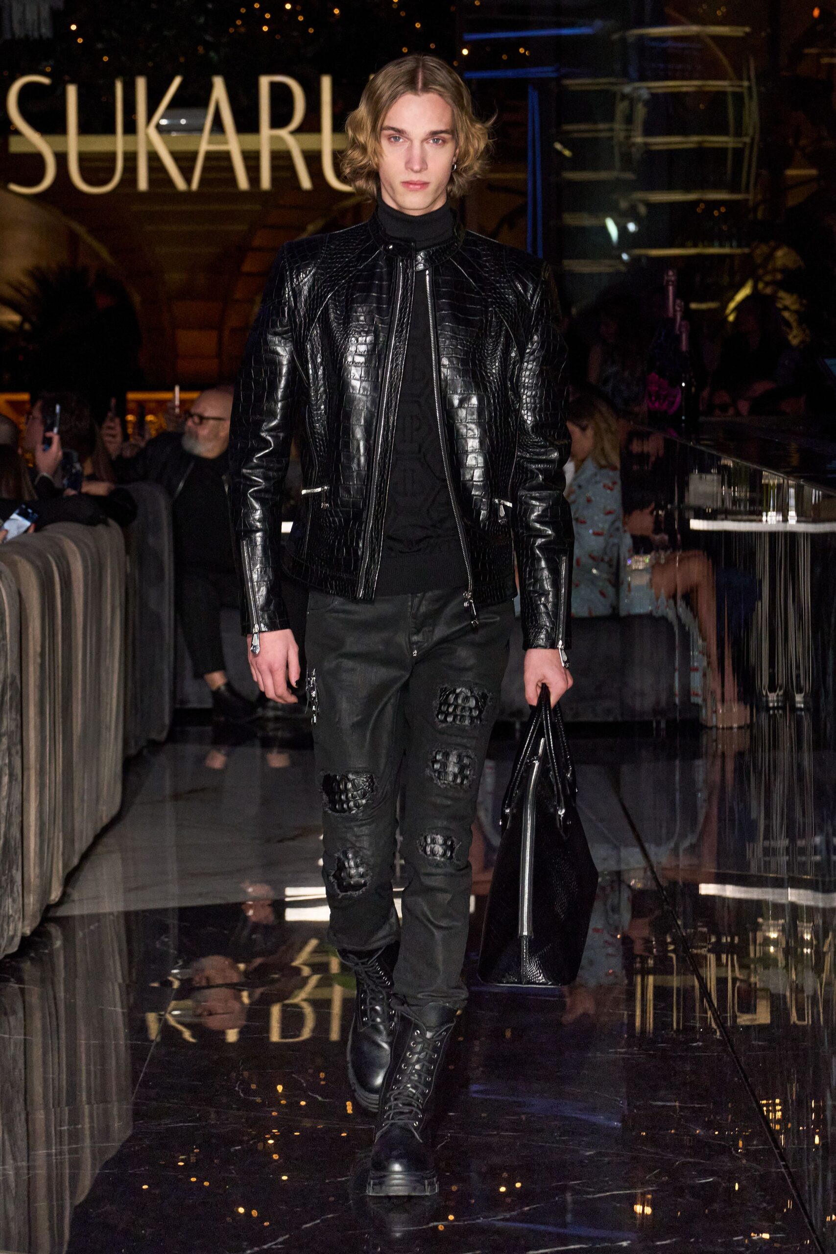 black leather long-sleeve collared fitted zippered textured jacket