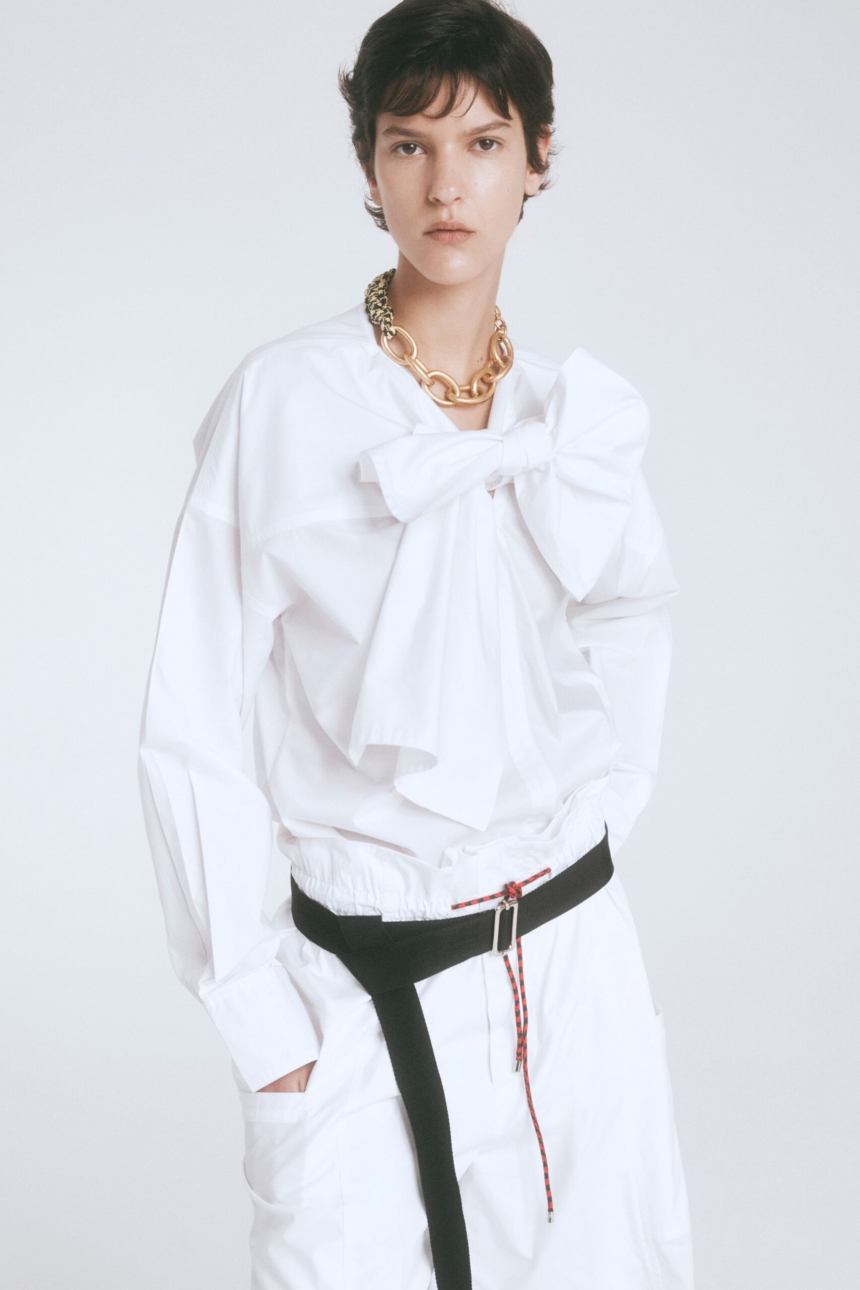 white relaxed shirt and pants