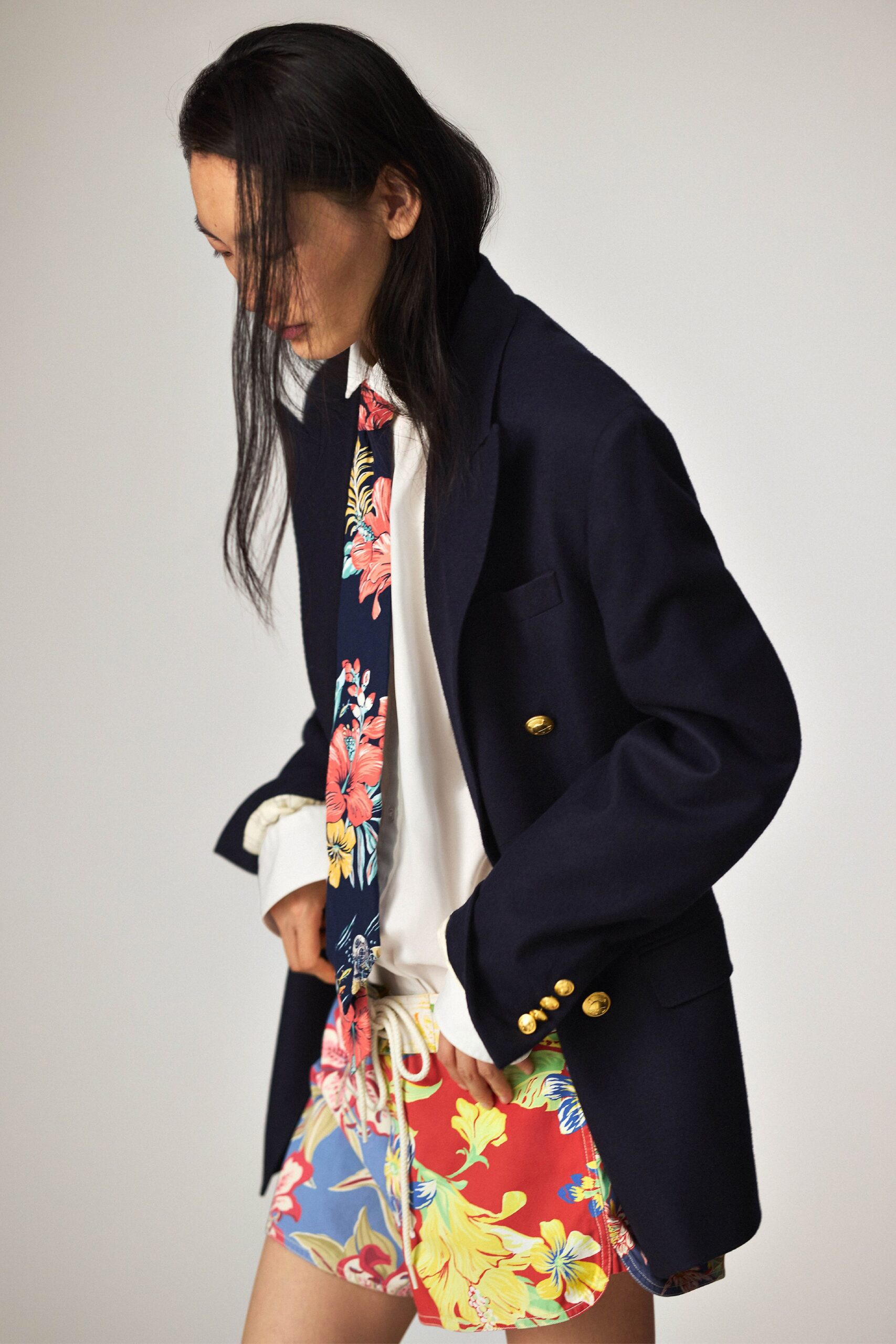 black tailored blazer with floral shorts