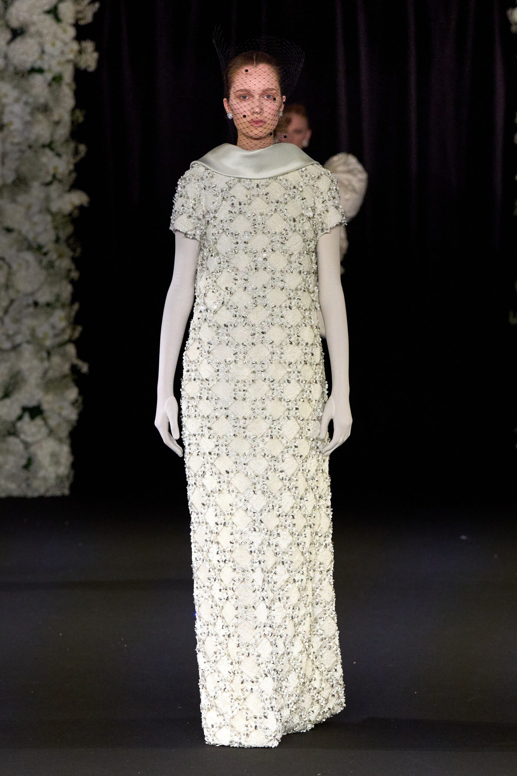 white embroidered fitted gown