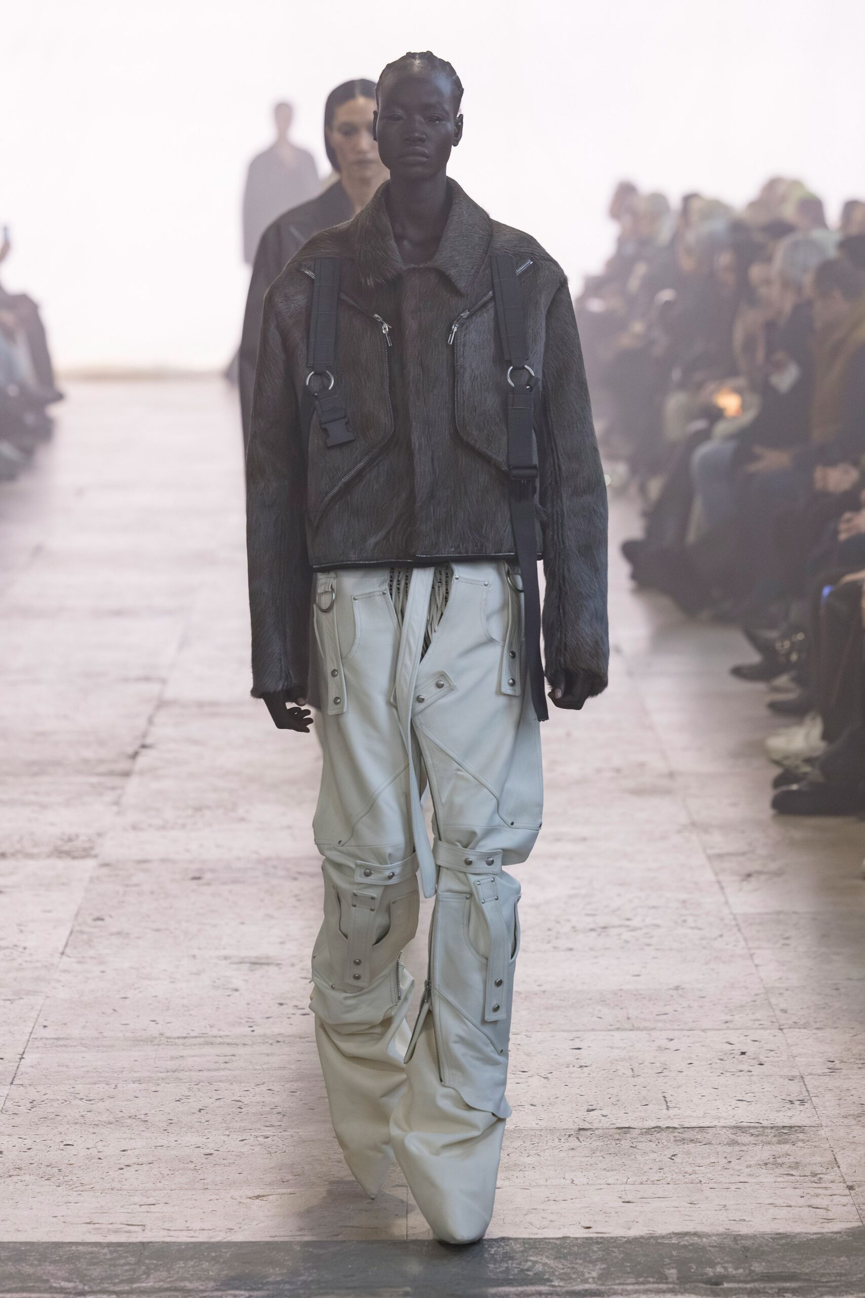 black fur jacket white cargo pants