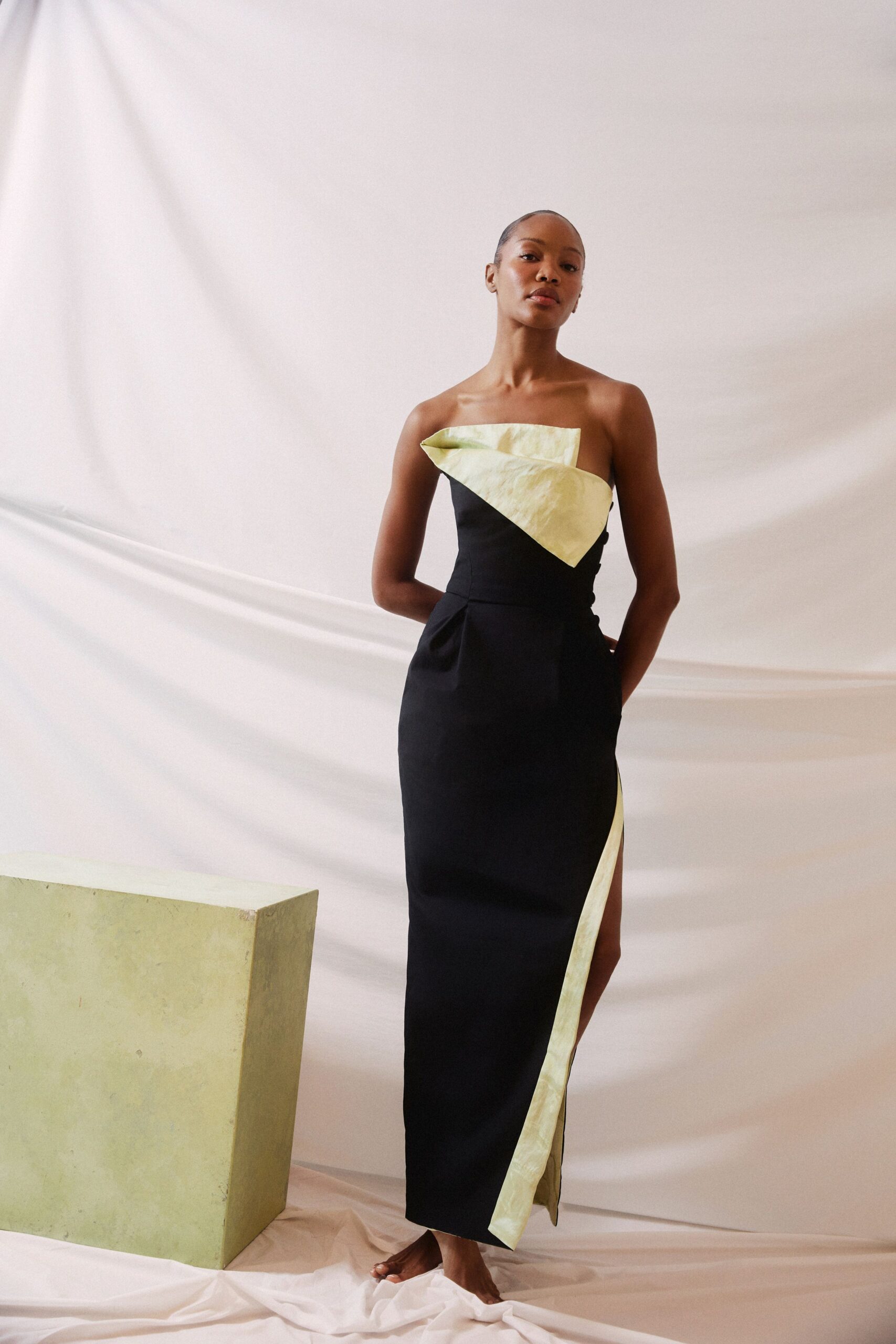 black and green asymmetric gown