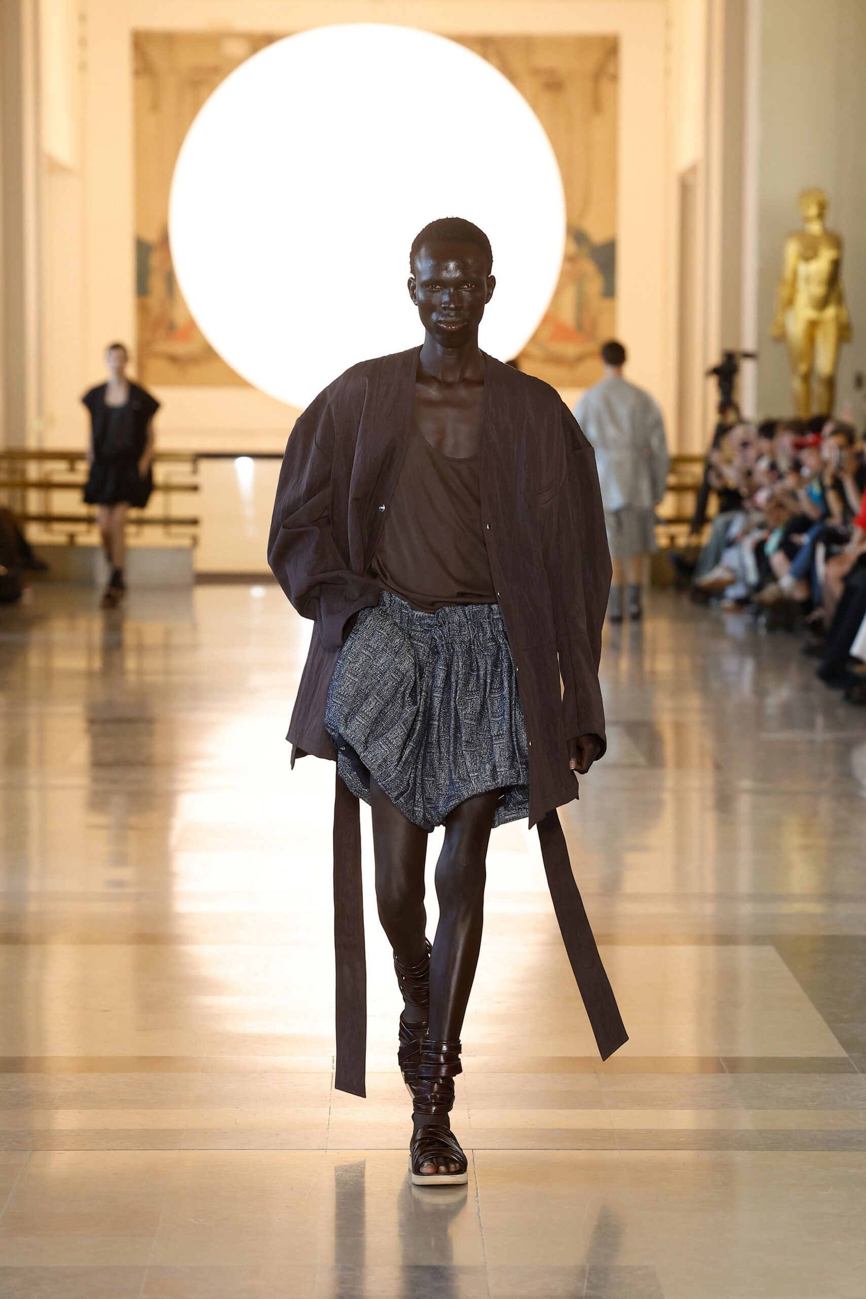 brown relaxed jacket with pleated skirt