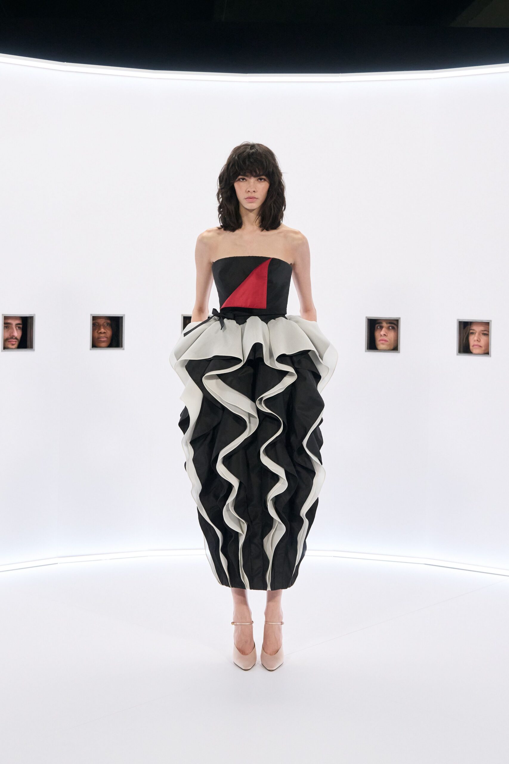 black and white ruffled midi dress with heels