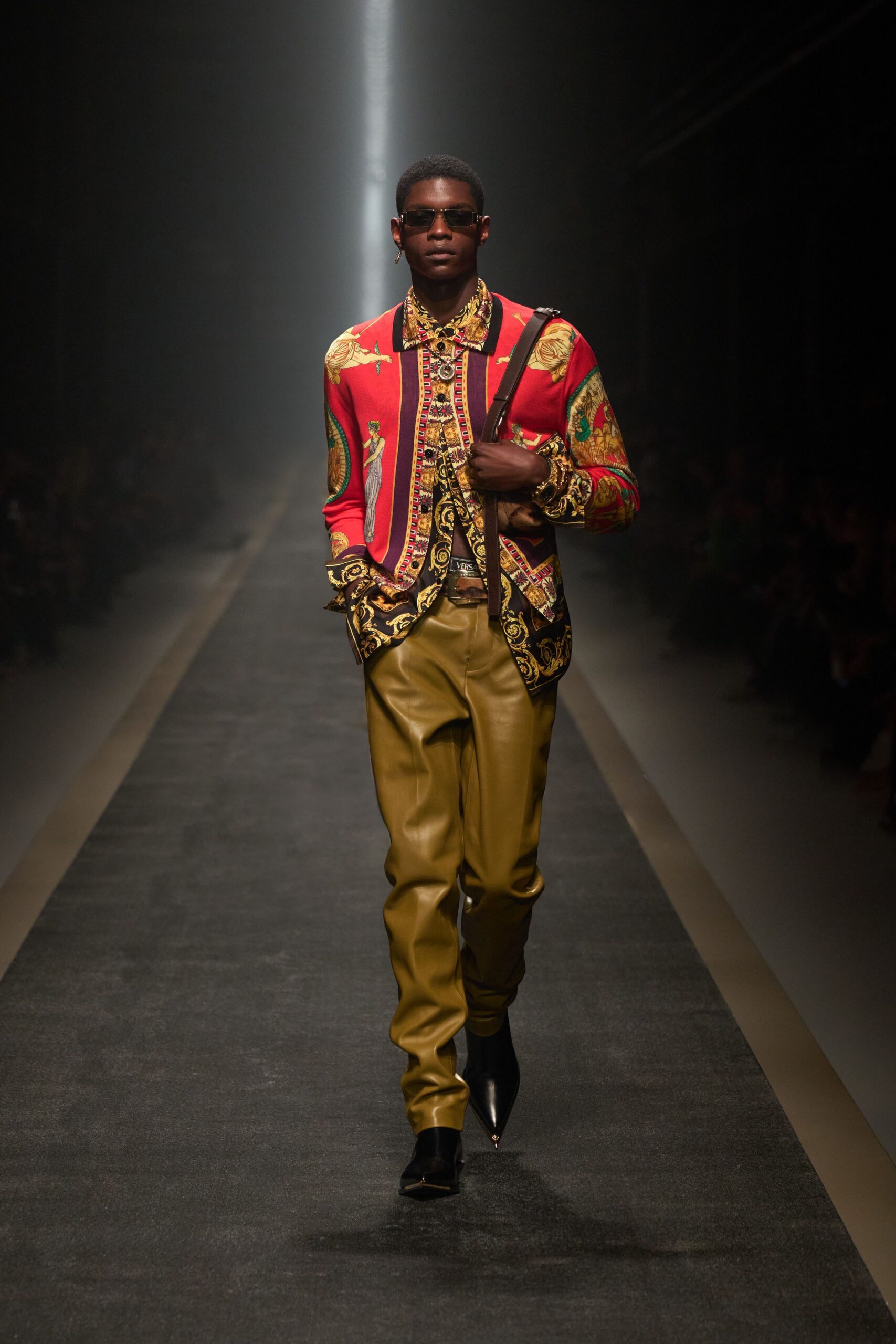 red printed silk shirt with gold pants