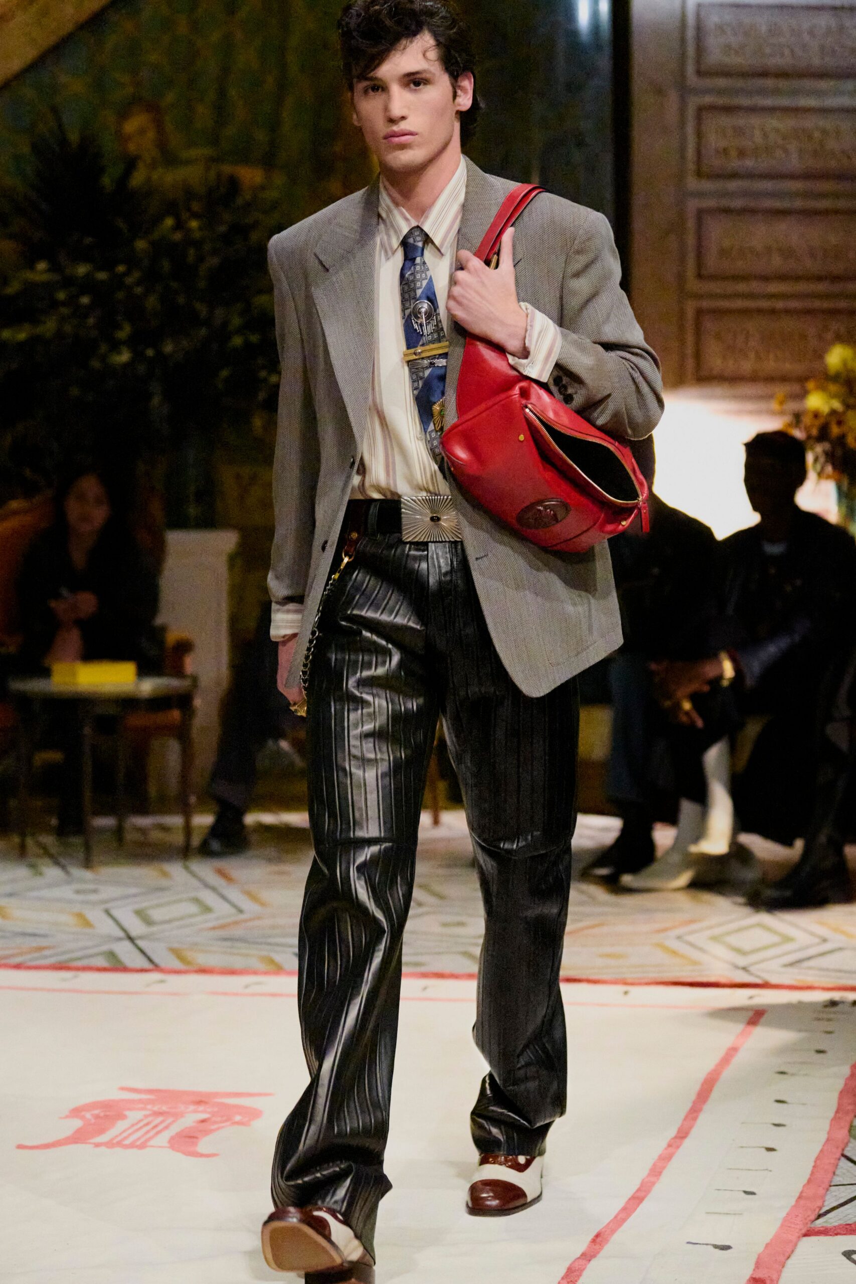 gray tailored blazer with red bag