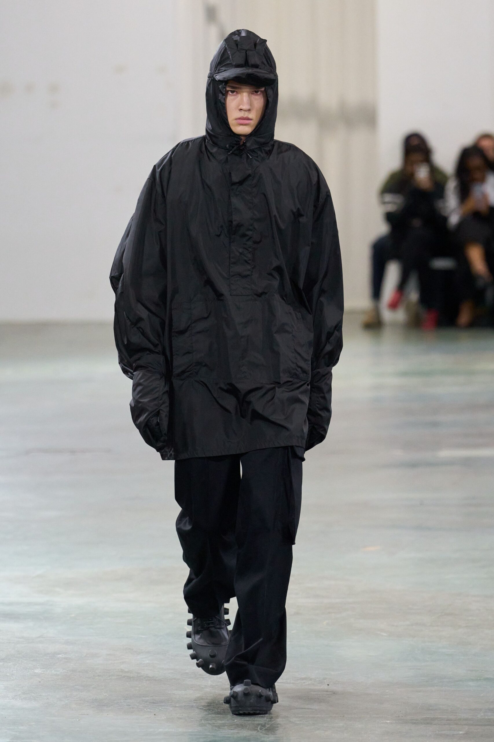 black oversized vinyl jacket and pants