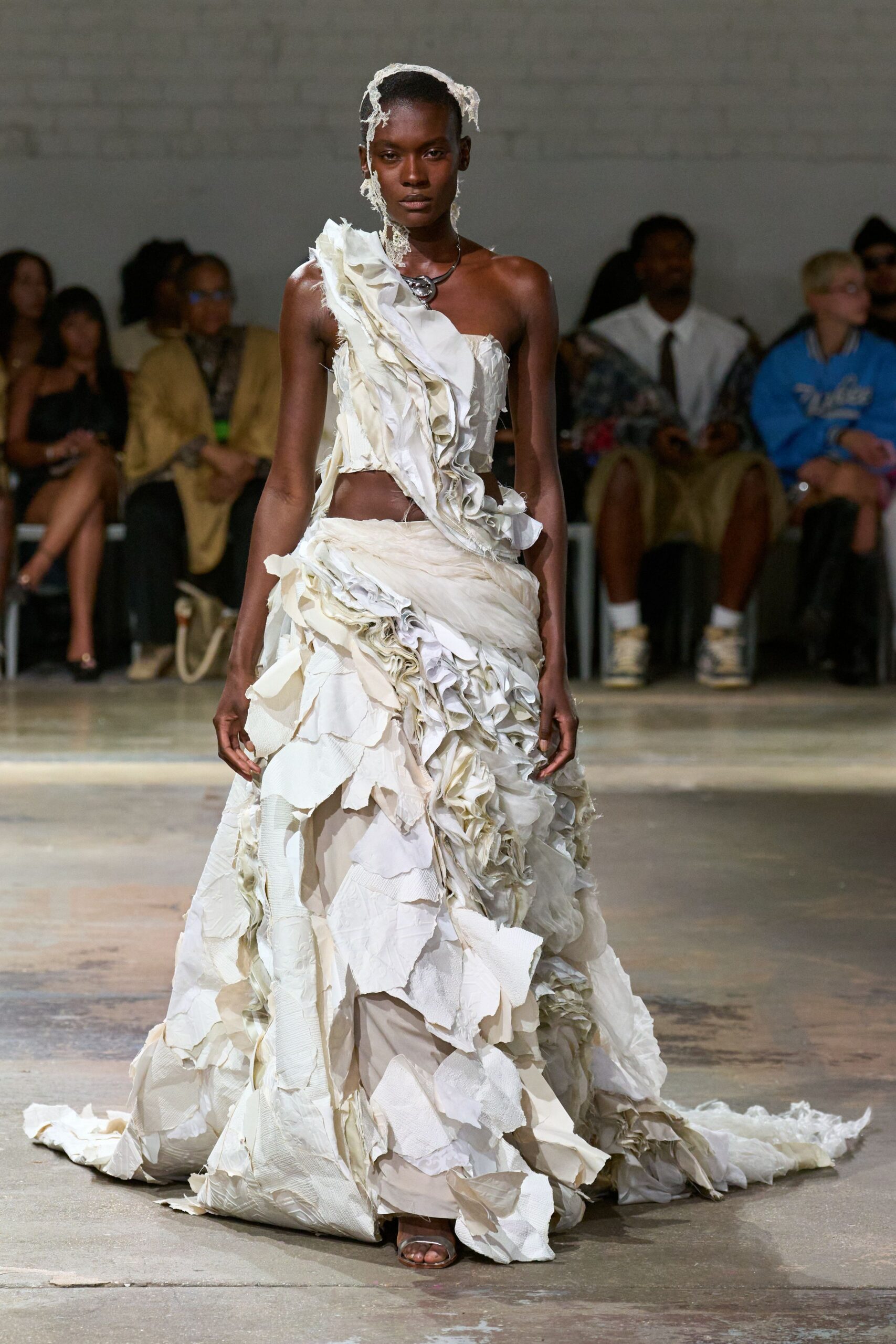 white ruffled asymmetric gown