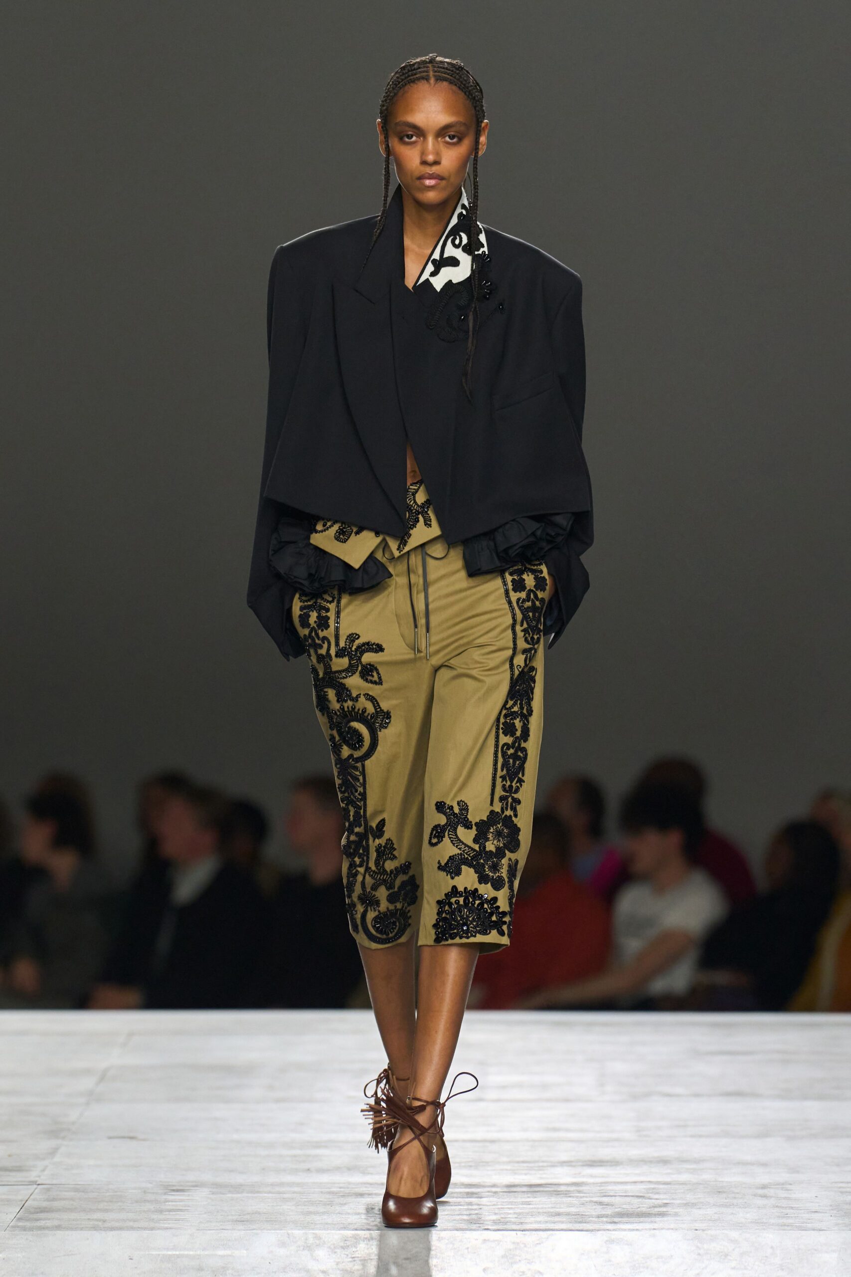 black oversized blazer beige pants