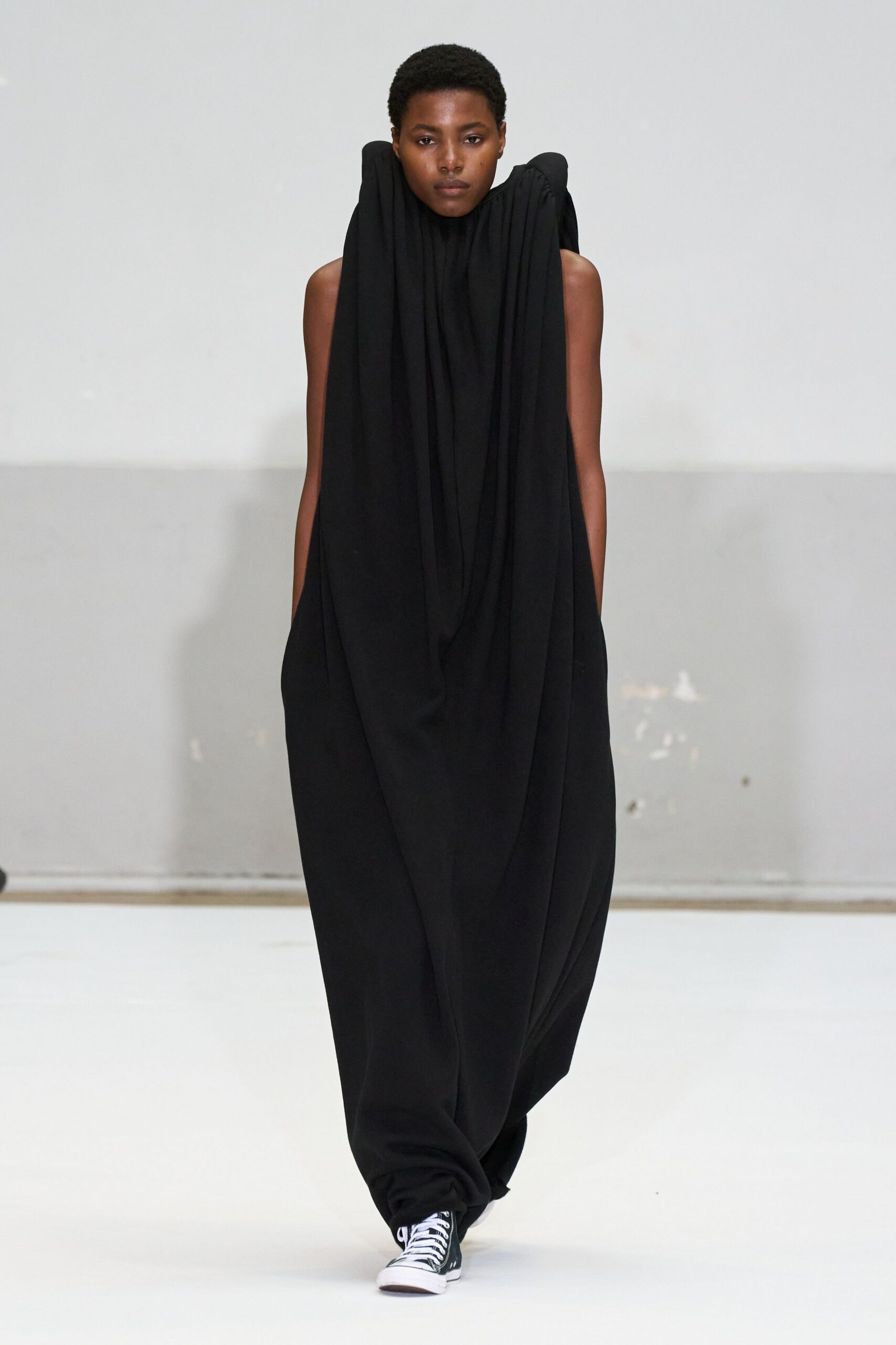 black draped maxi dress with sneakers