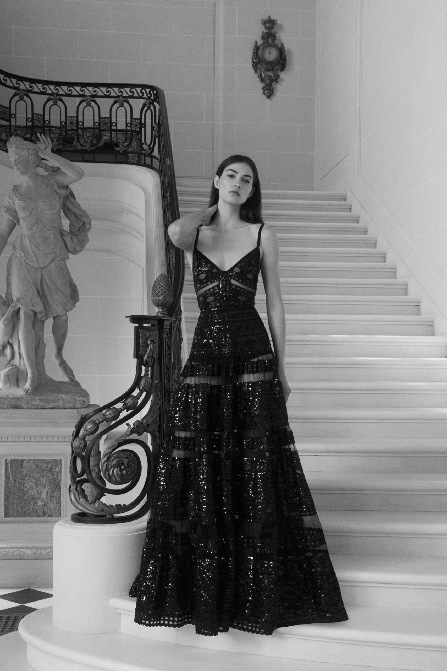 black sequined sleeveless gown