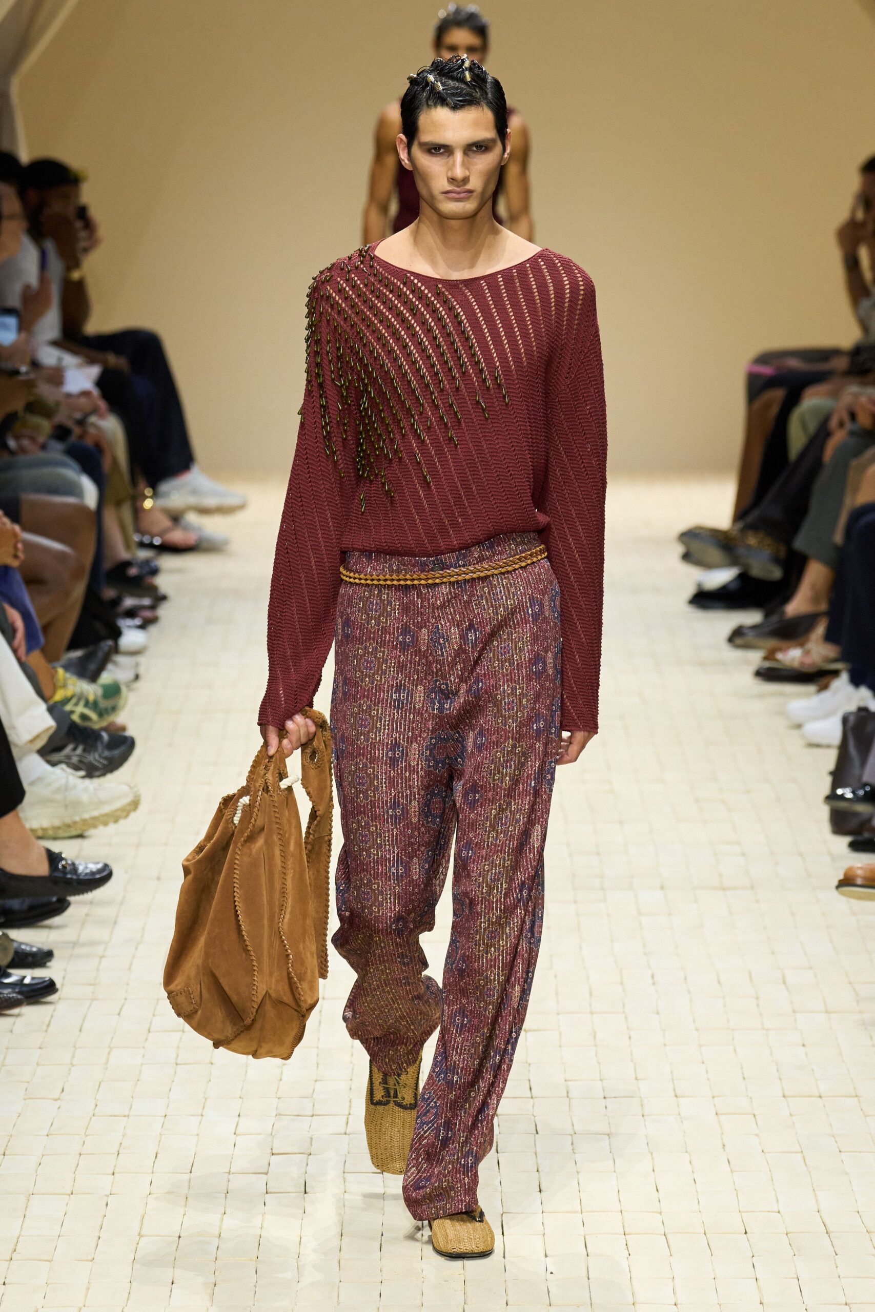 red knit relaxed top with multi flared pants
