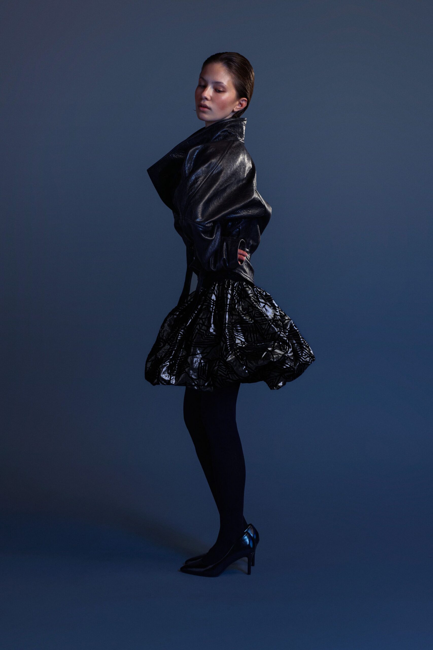 black leather long-sleeve collared oversized zippered coat