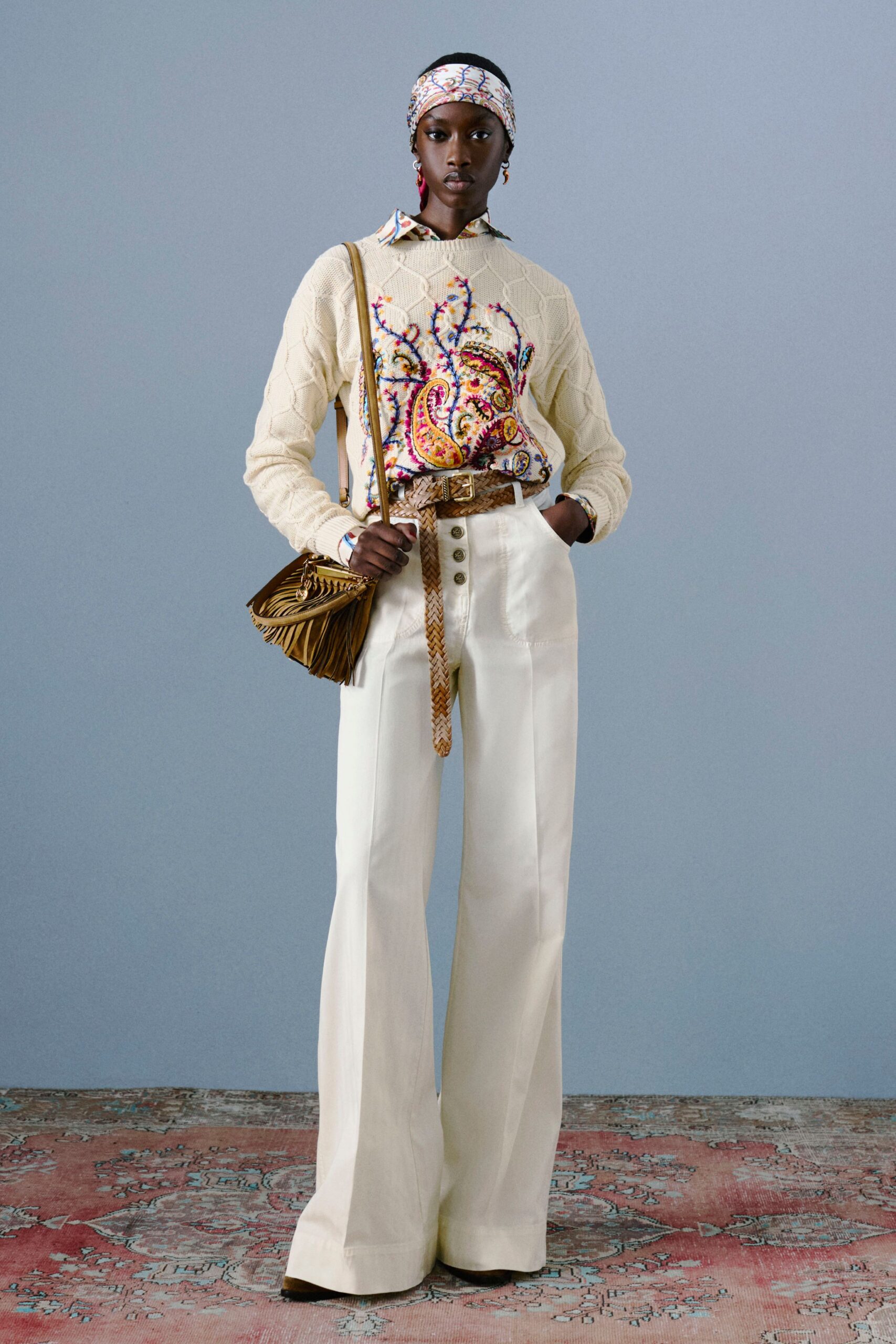 cream embroidered sweater with flared pants