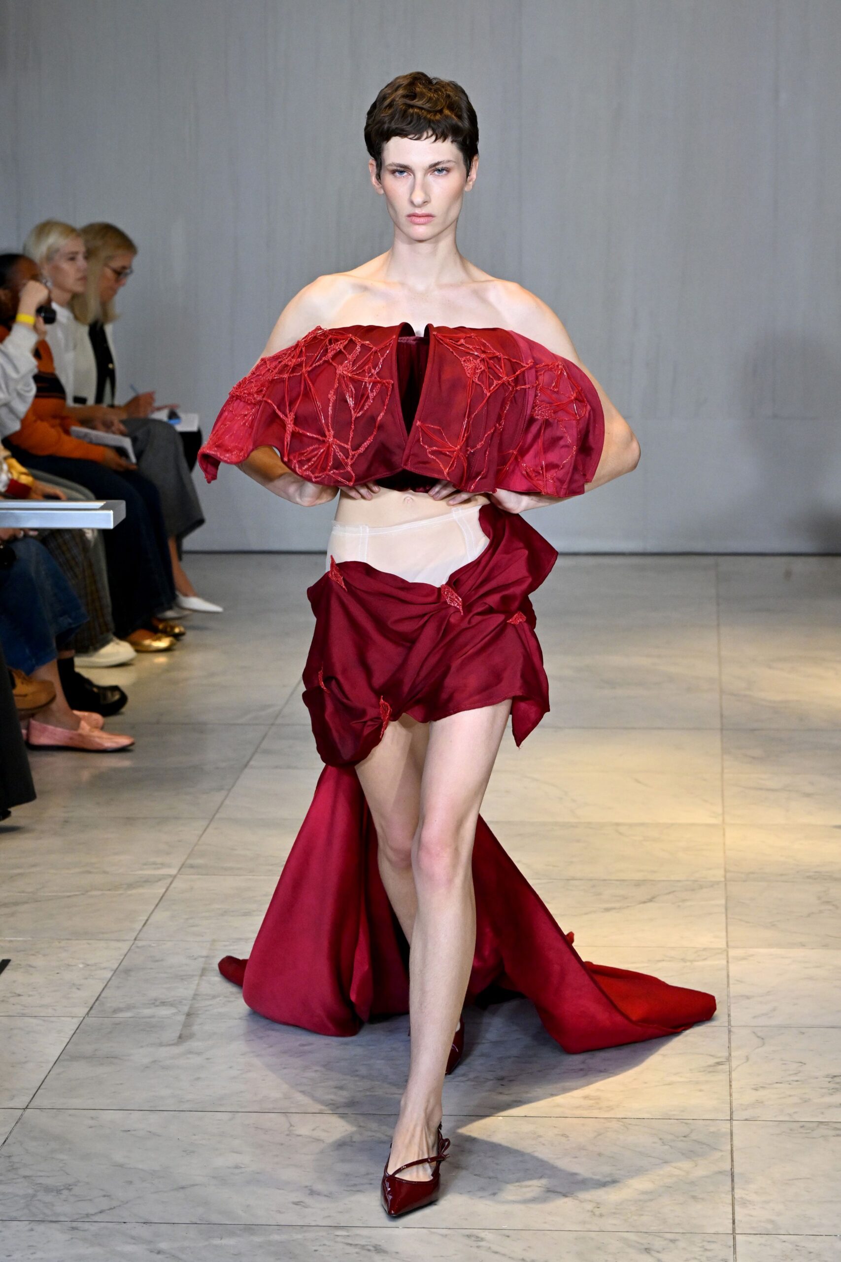 red silk strapless fitted ruffled maxi gown