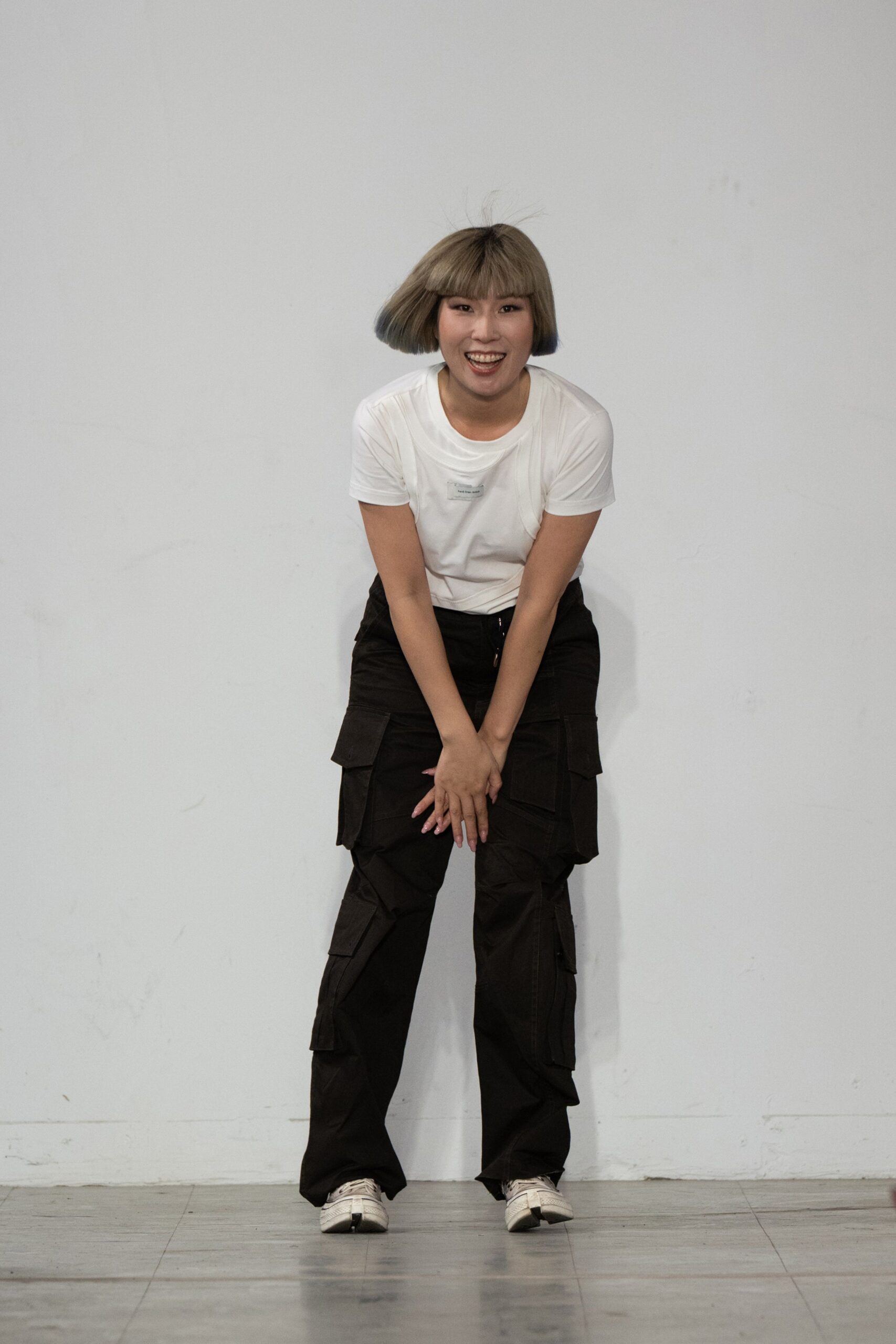 white t-shirt black cargo pants