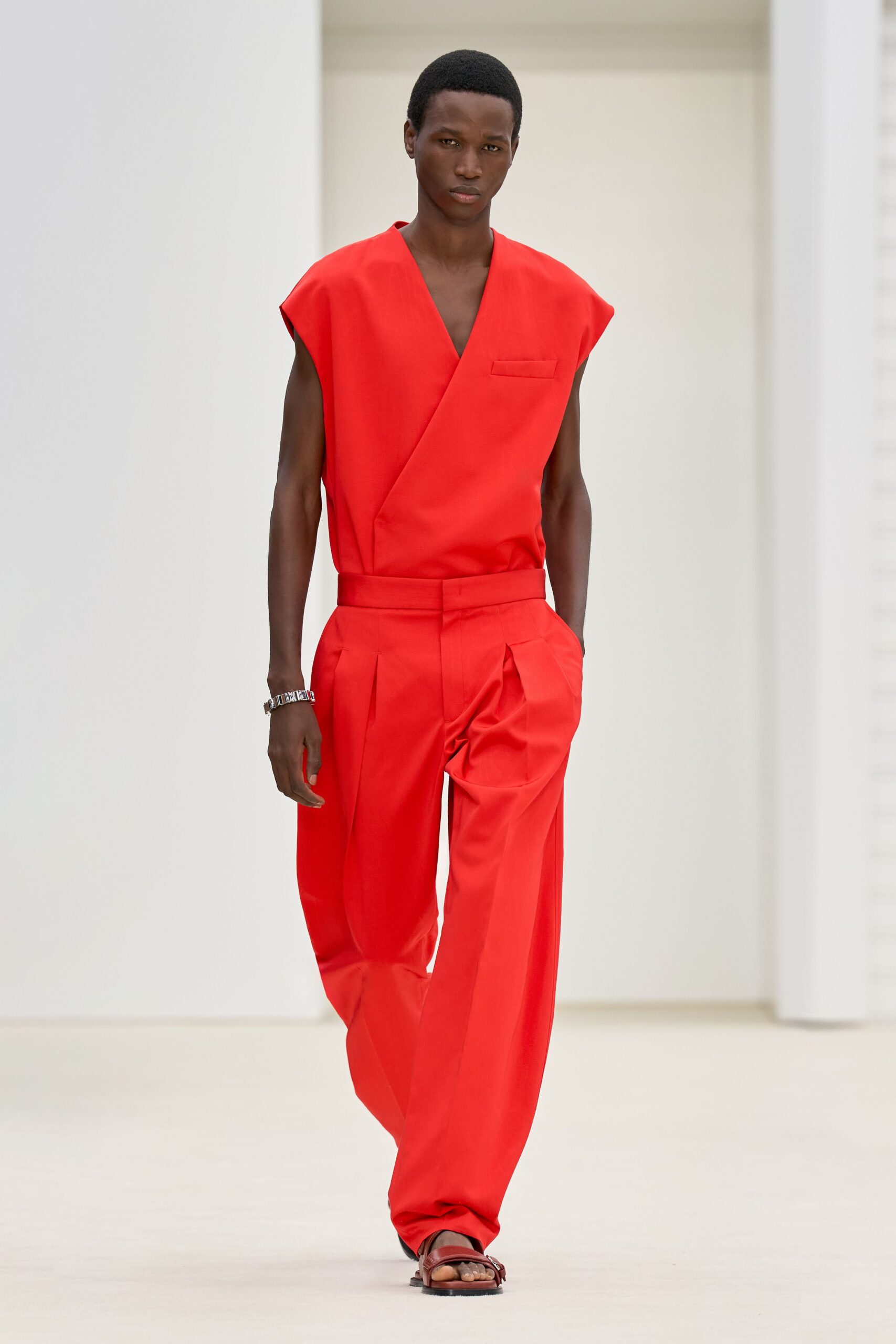 red sleeveless v-neck relaxed pleated top