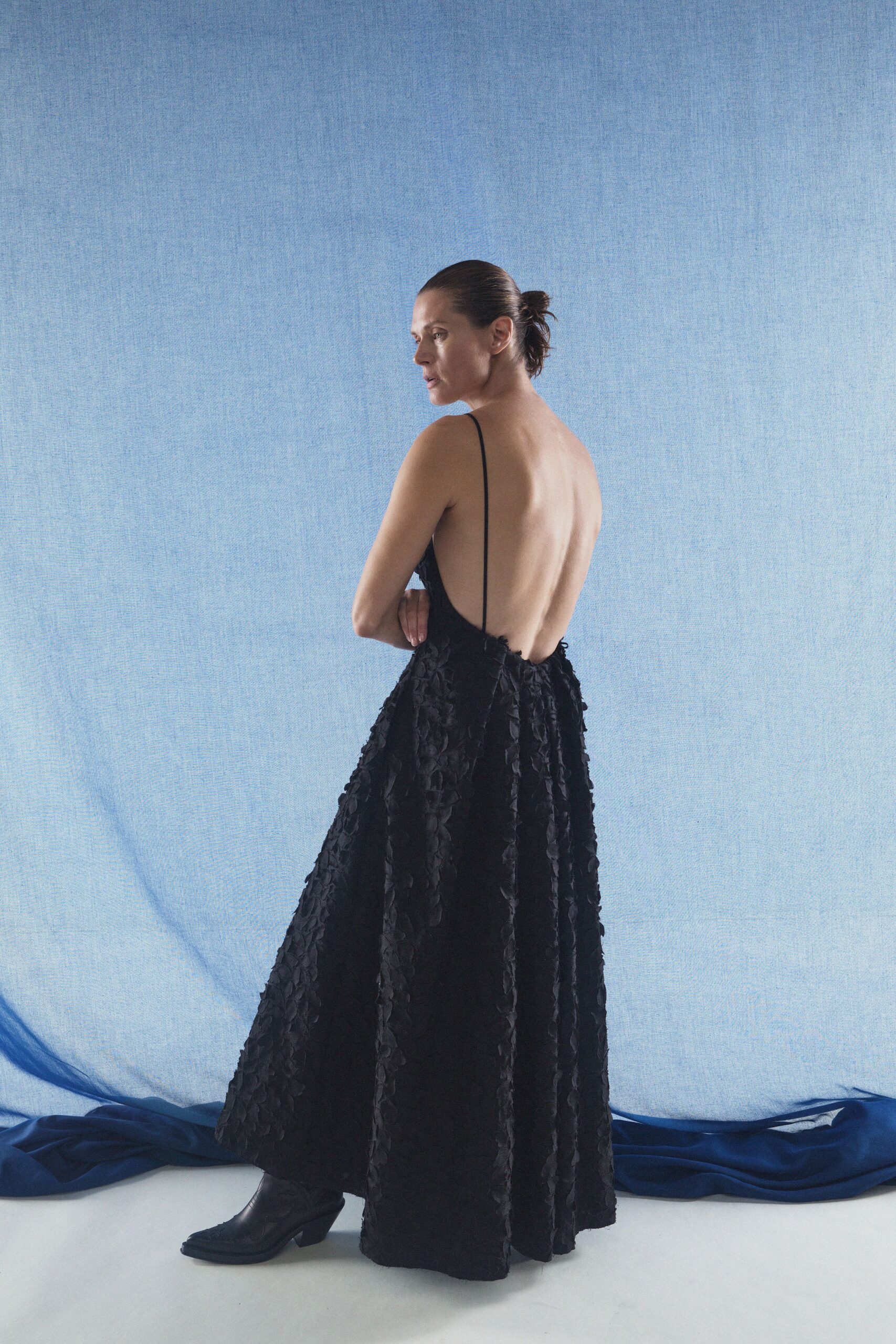 black silk pleated gown with boots