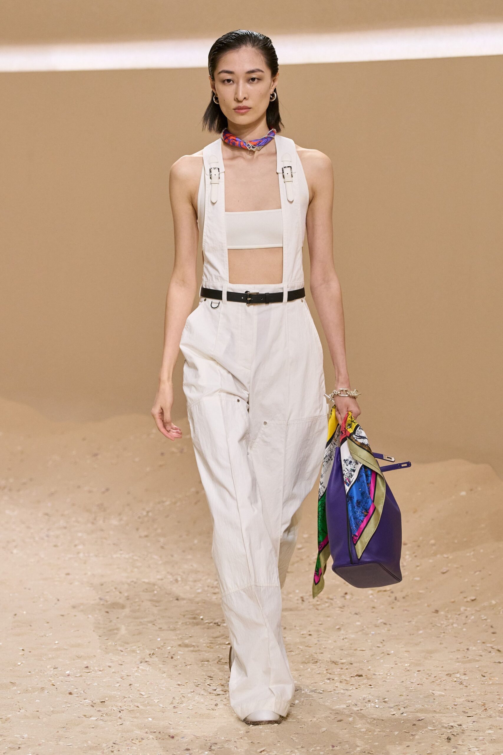 white fitted jumpsuit with accessories