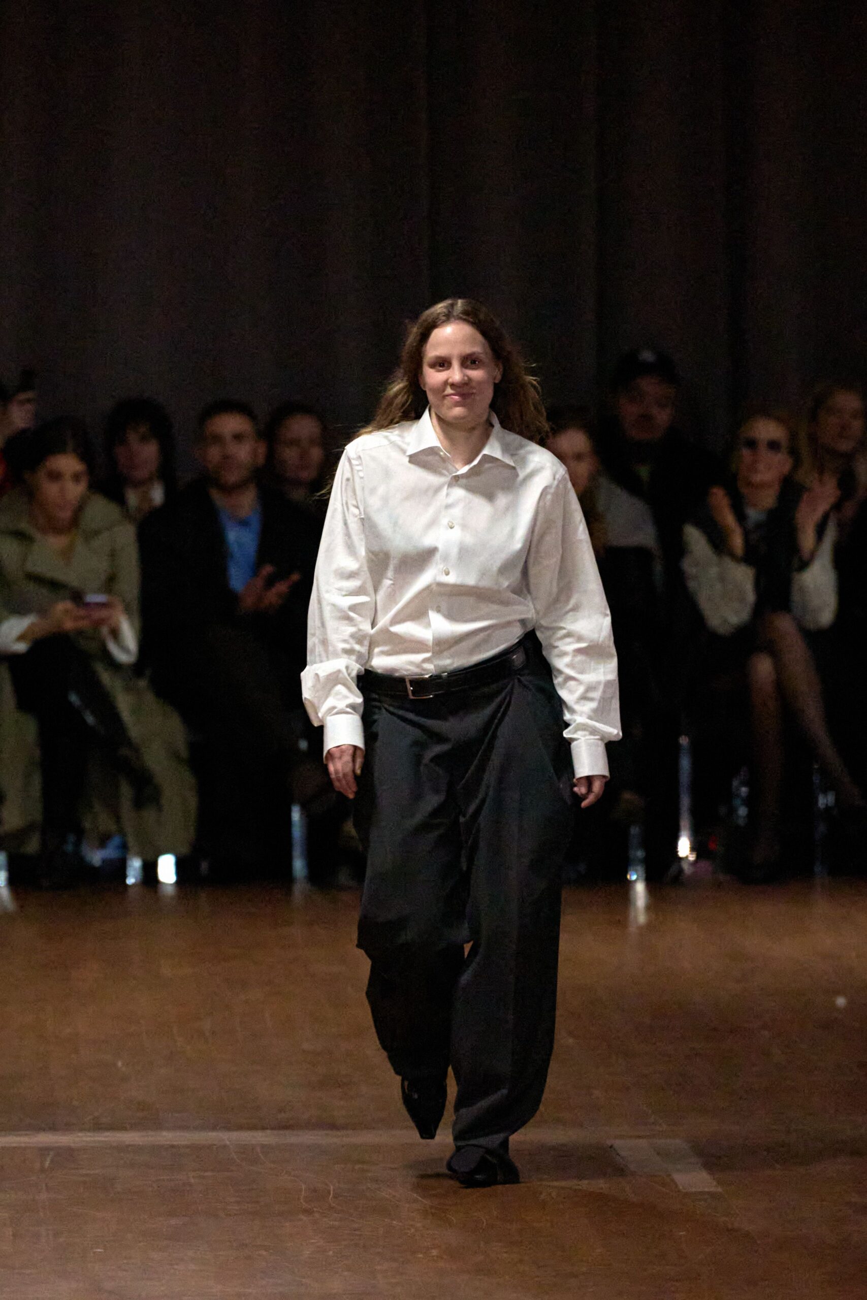 white relaxed shirt and black pants