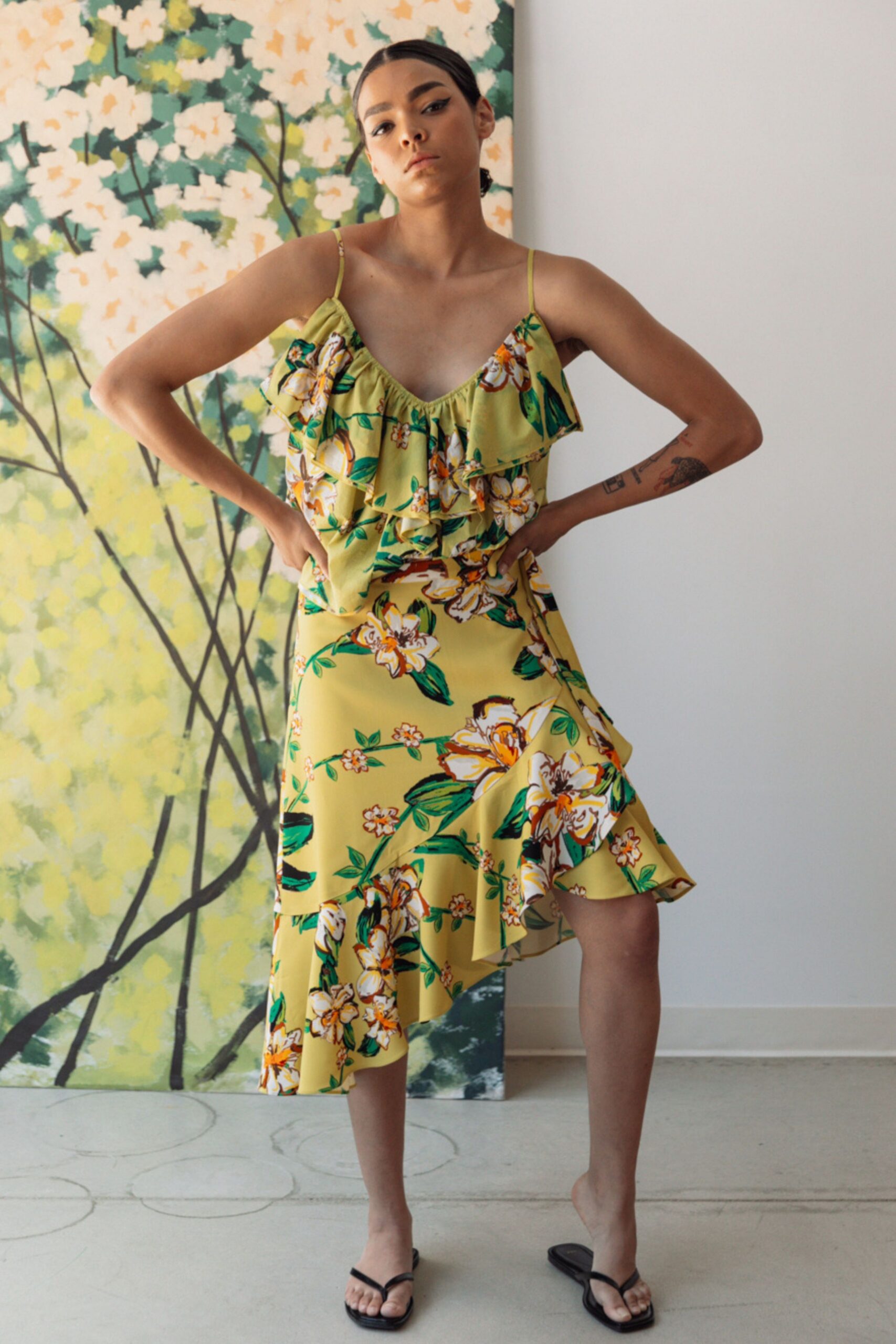 yellow silk sleeveless v-neck fitted ruffled flared dress